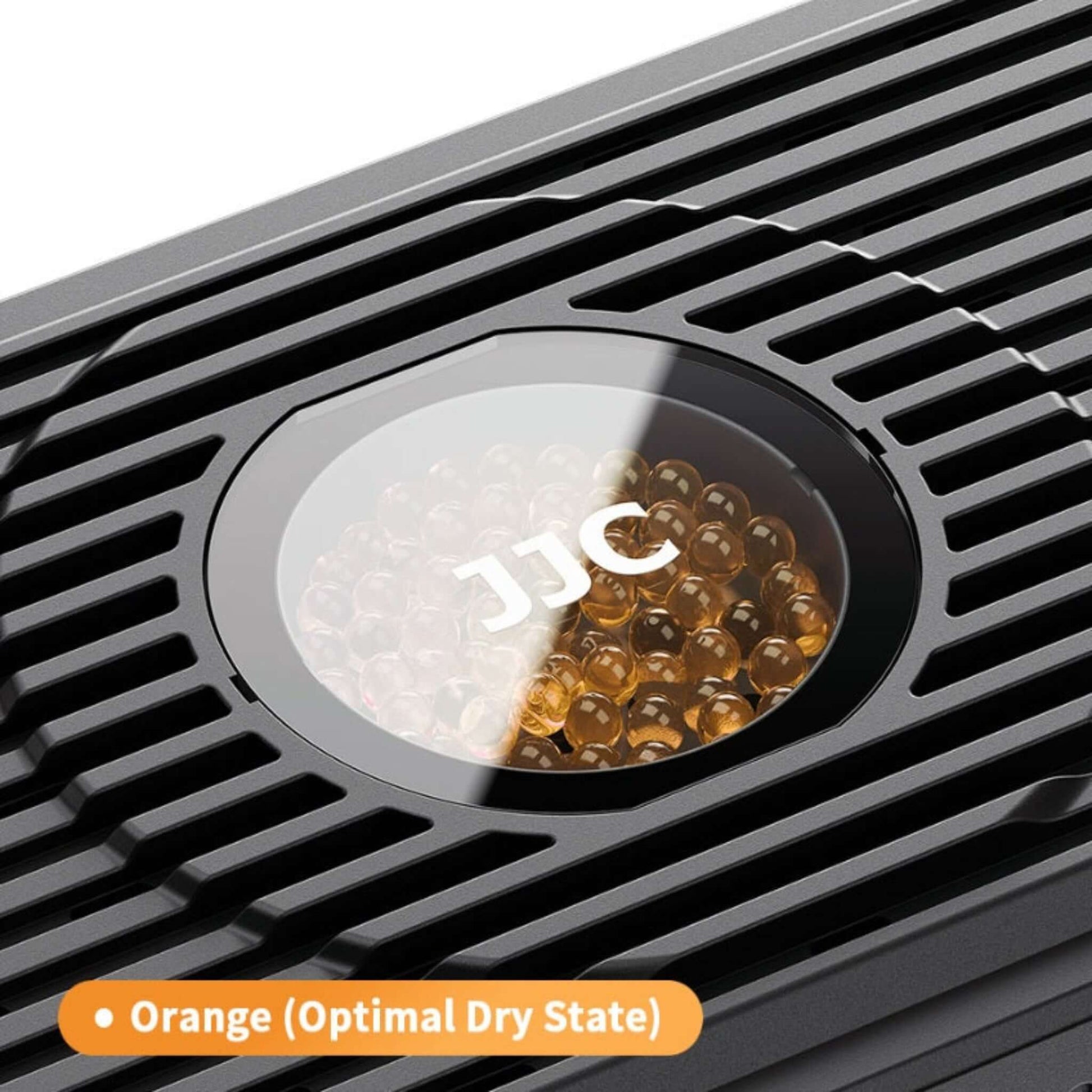 Close up of JJC RD-1 silica gel beads in orange dry state.