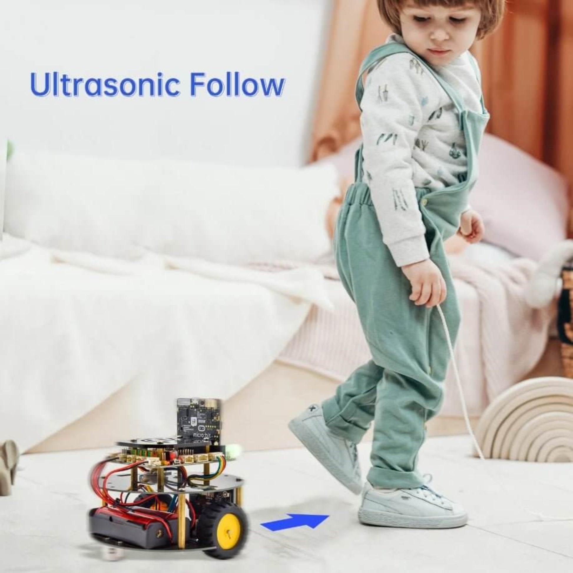 Child interacting with Keyestudio Micro:bit Mini Smart Turtle Robot Car featuring ultrasonic follow technology.