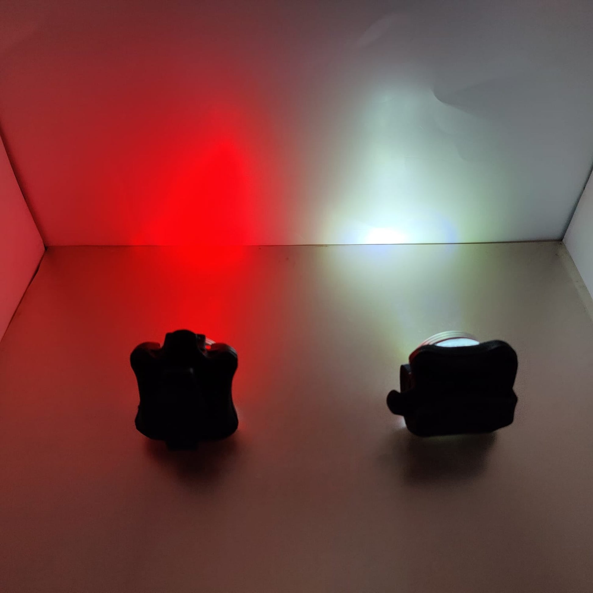 High-brightness LED bike light beam test showing red and white safety lights for night cycling.
