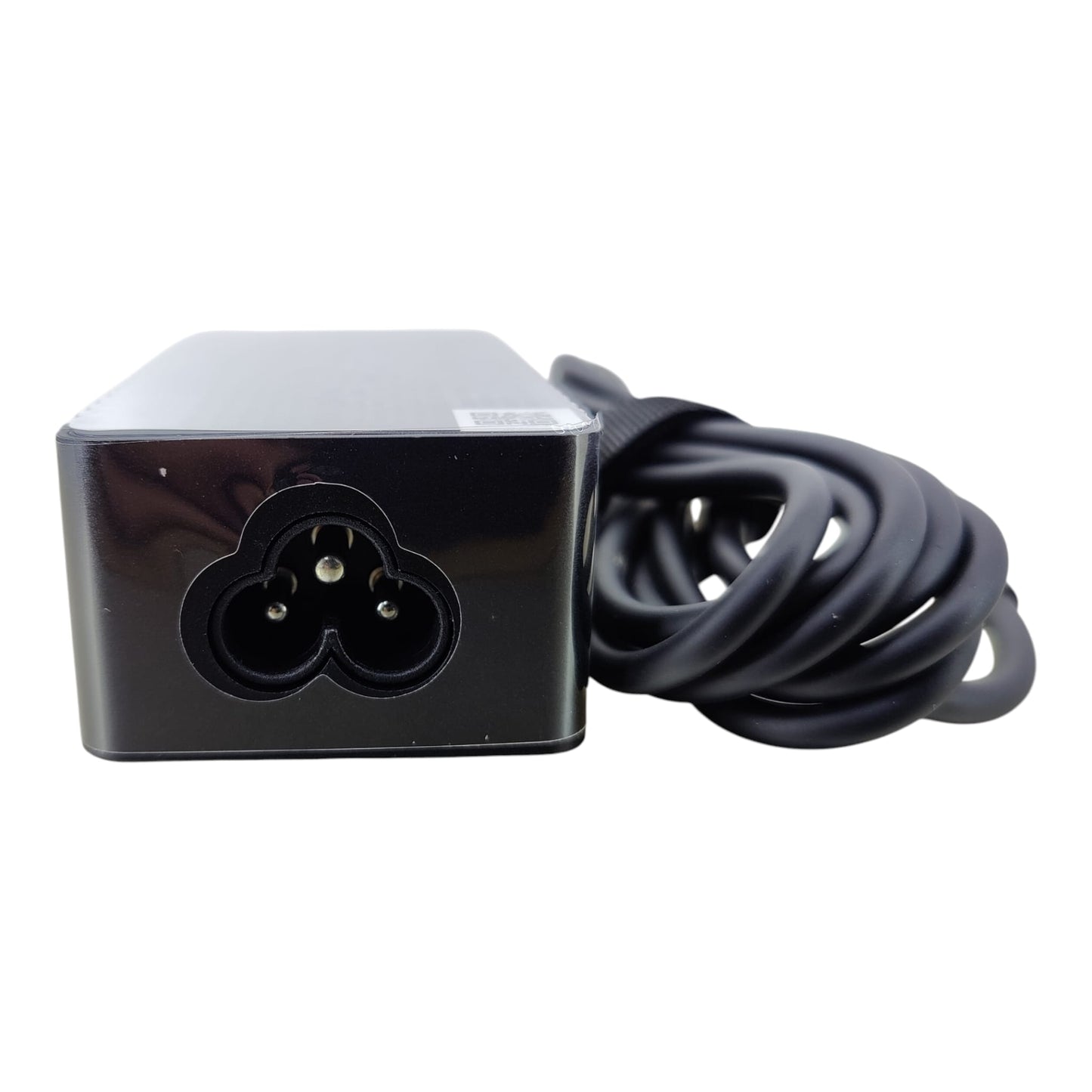 Close-up of the C5 Mickey Mouse power input port on a 65W Lenovo Type-C laptop charger.