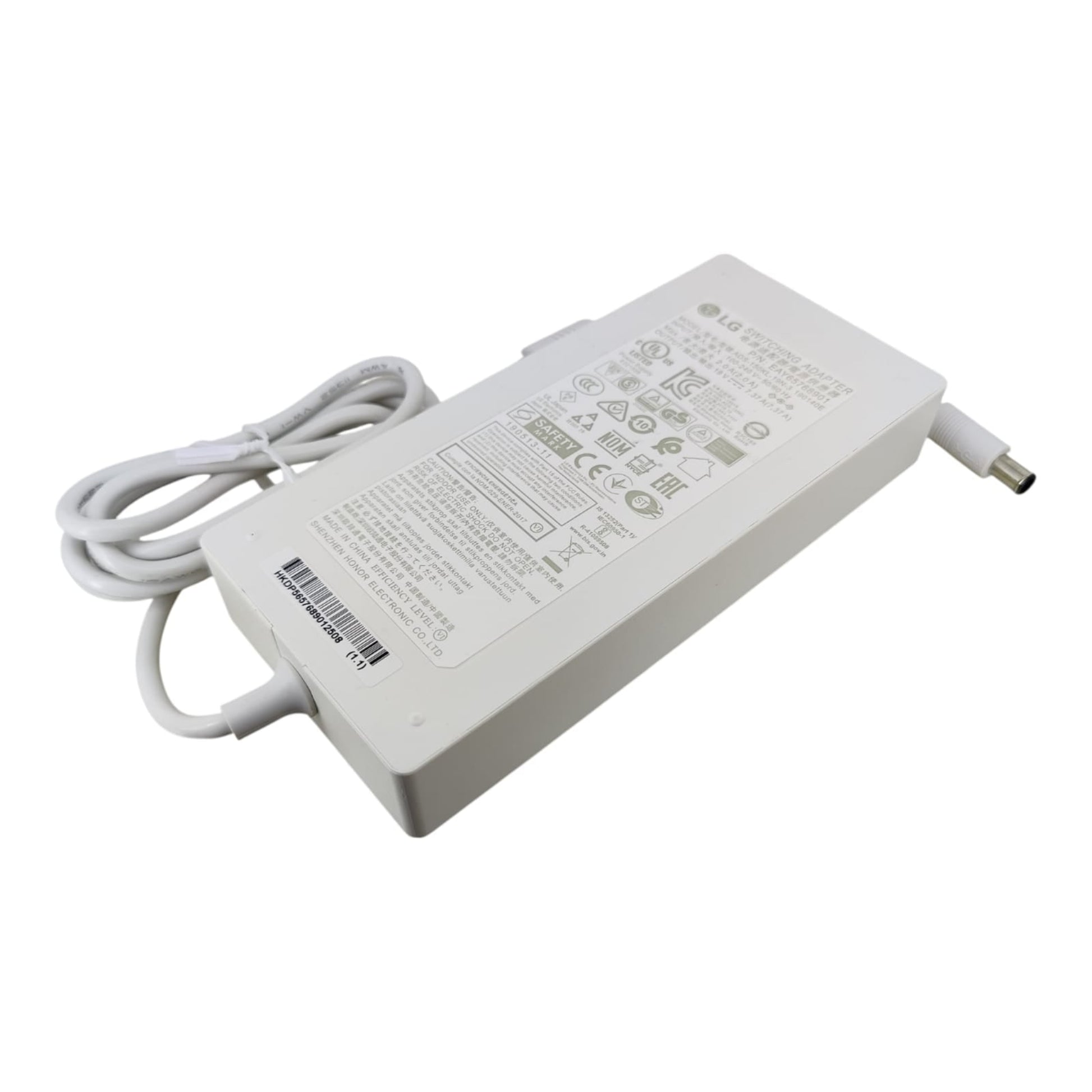 Close up of 6.5mm x 4.4mm DC connector tip for LG monitors held in hand.