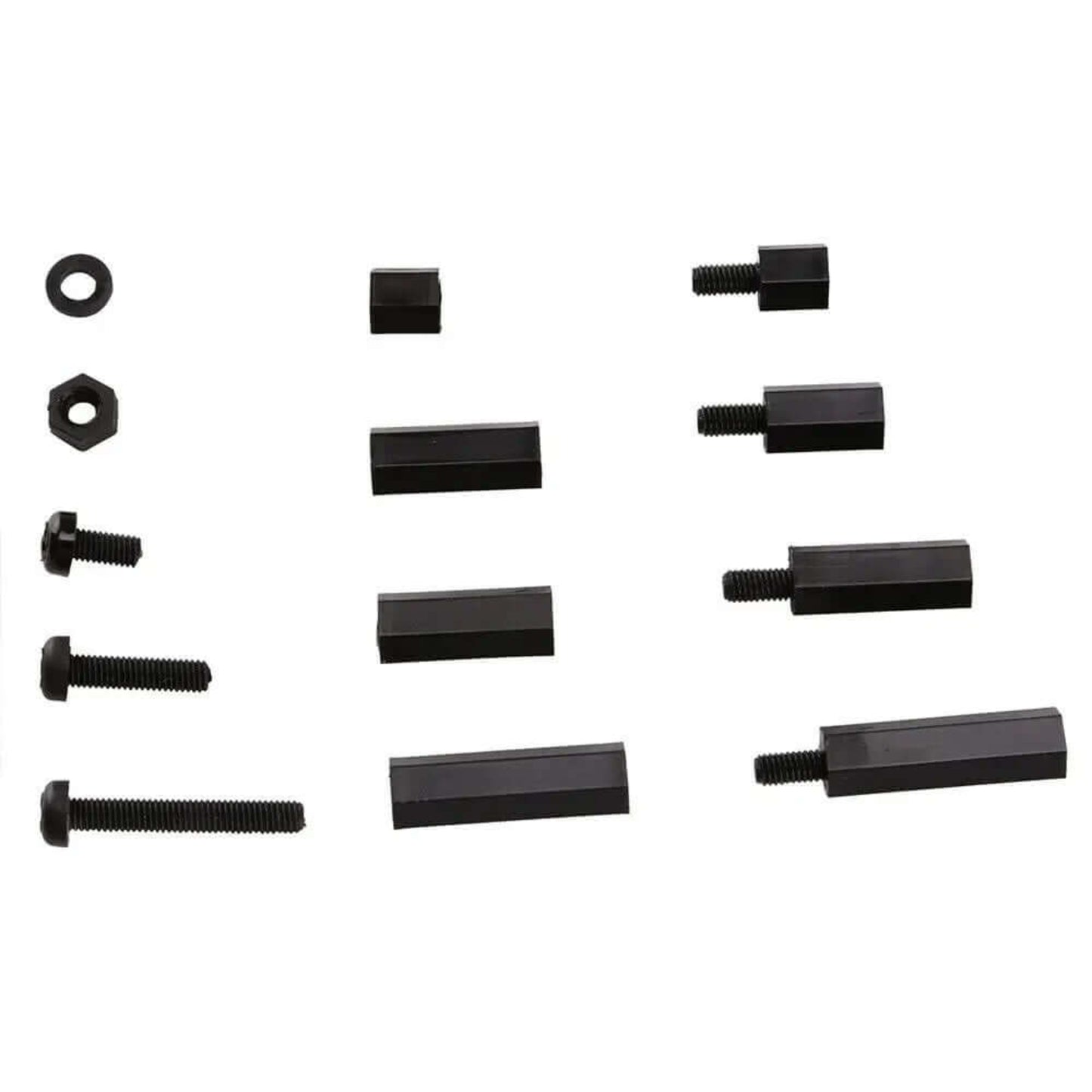 Close-up arrangement of various M3 nylon components: washers, nuts, screws, single-head standoffs, and double-pass standoffs.