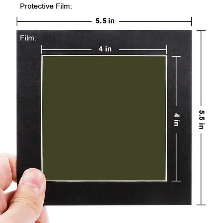 Person holding 4x4 inch Magnetic Field Viewing Film with protective measurements displayed.