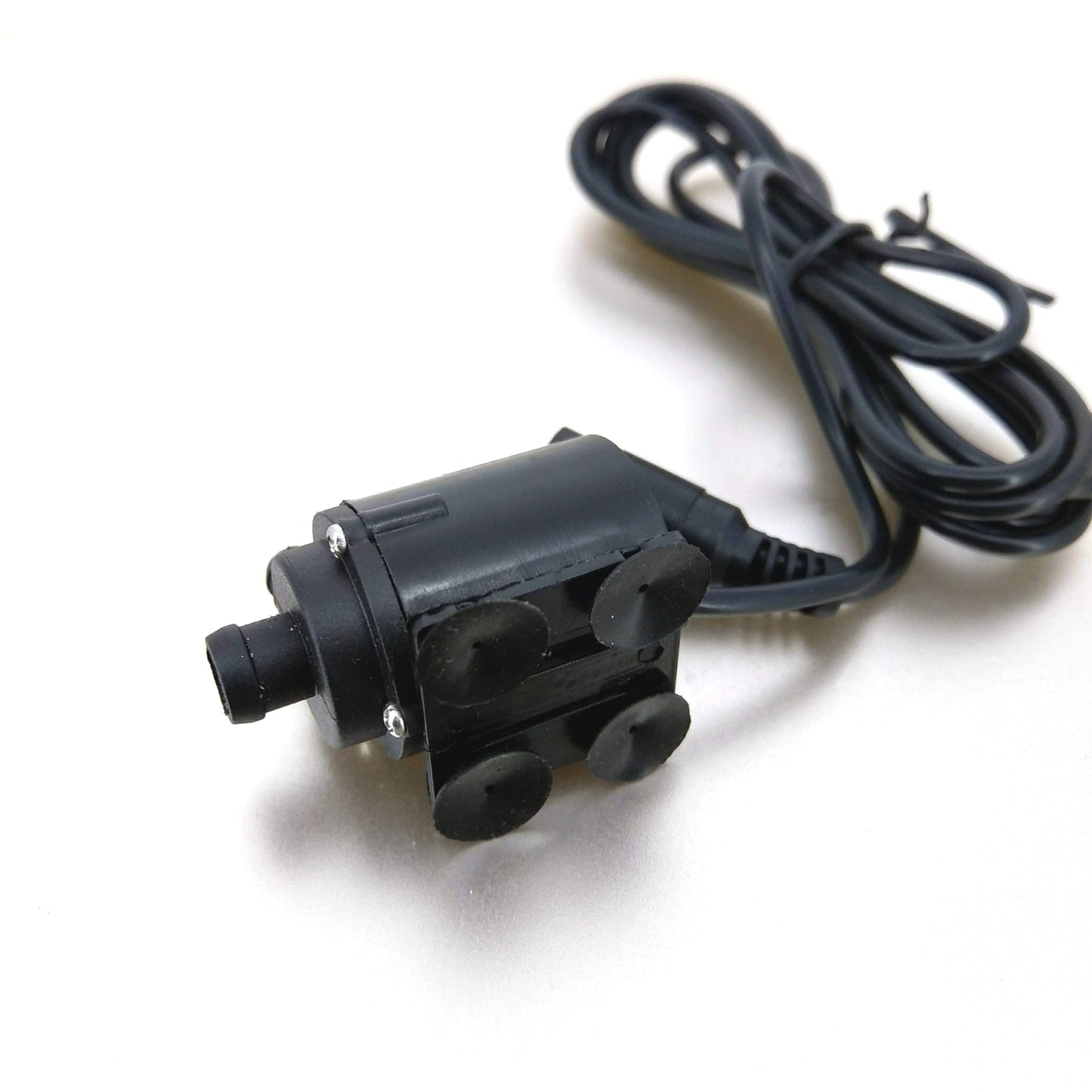 Underside of 12V mini water pump showing 4 suction cups for secure mounting.