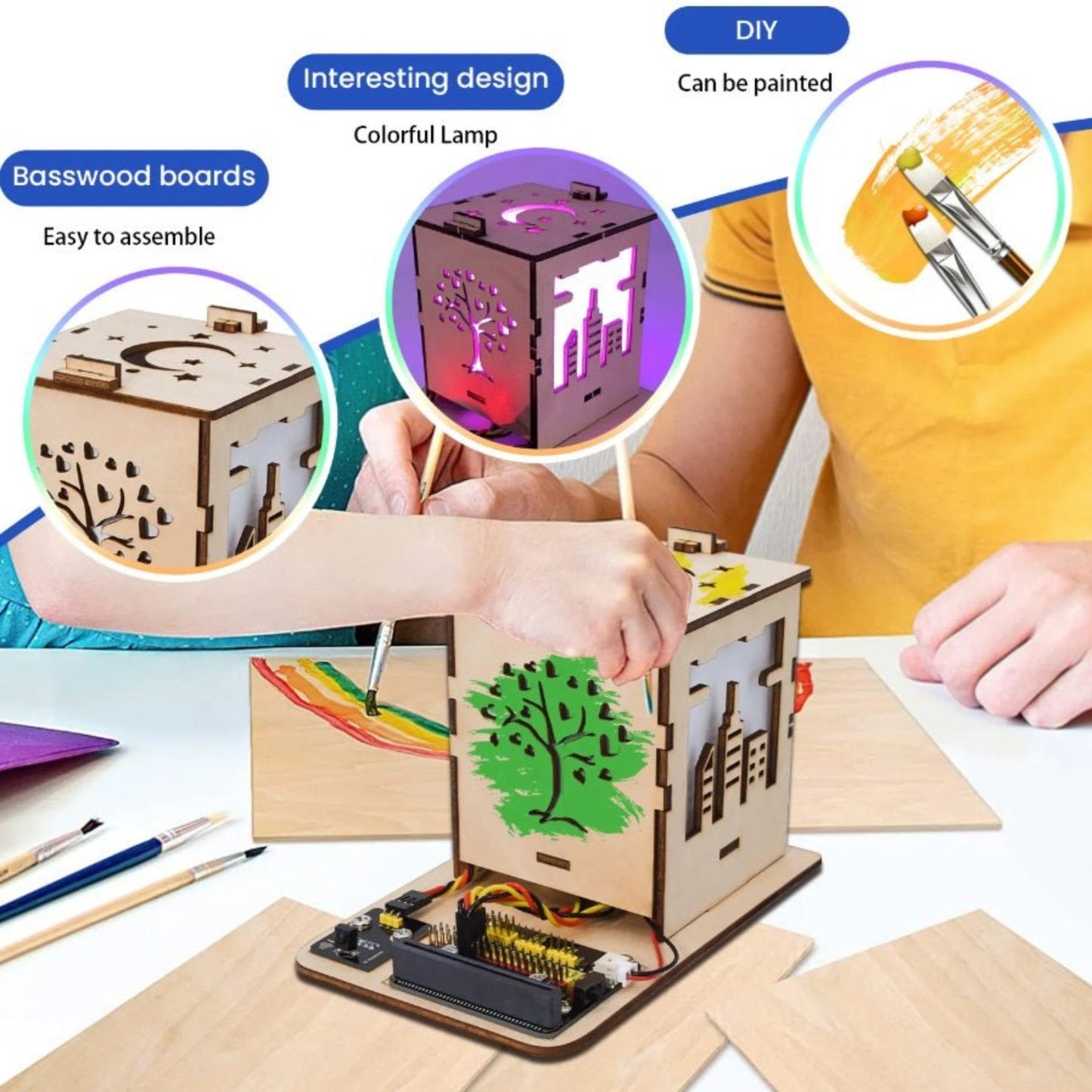 Colorful DIY light box kit on a table, featuring basswood boards, easy assembly, and painting options for creative expression.