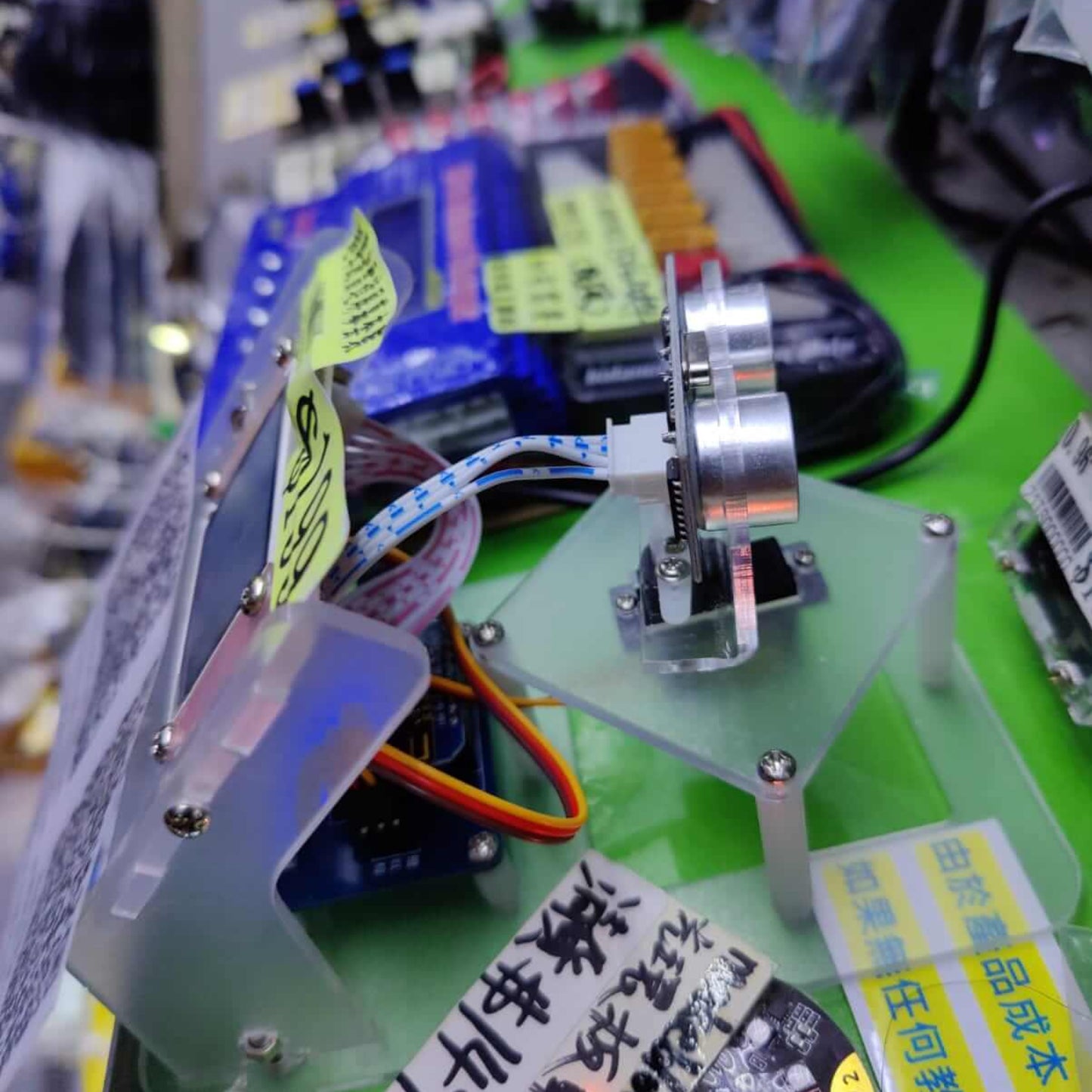Close-up of the ultrasonic radar module wiring and servo motor setup.
