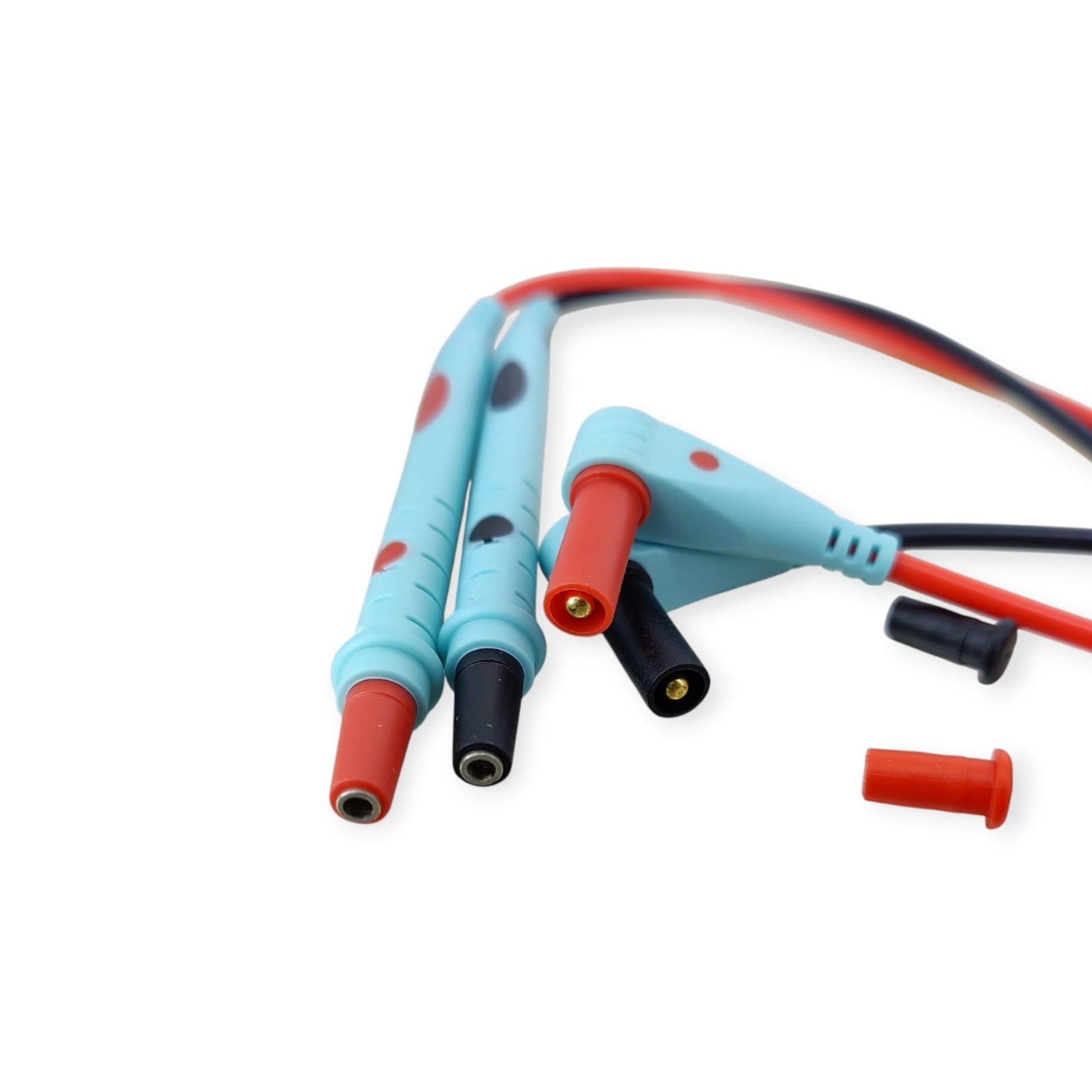 Close-up of the ergonomic handles and shrouded banana plugs of the red and black multimeter test leads with protective caps removed.