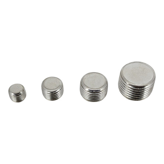 A group of nickel-plated brass pneumatic hex socket blanking plugs in 1/8", 1/4", 3/8", and 1/2" sizes for sealing air manifolds.