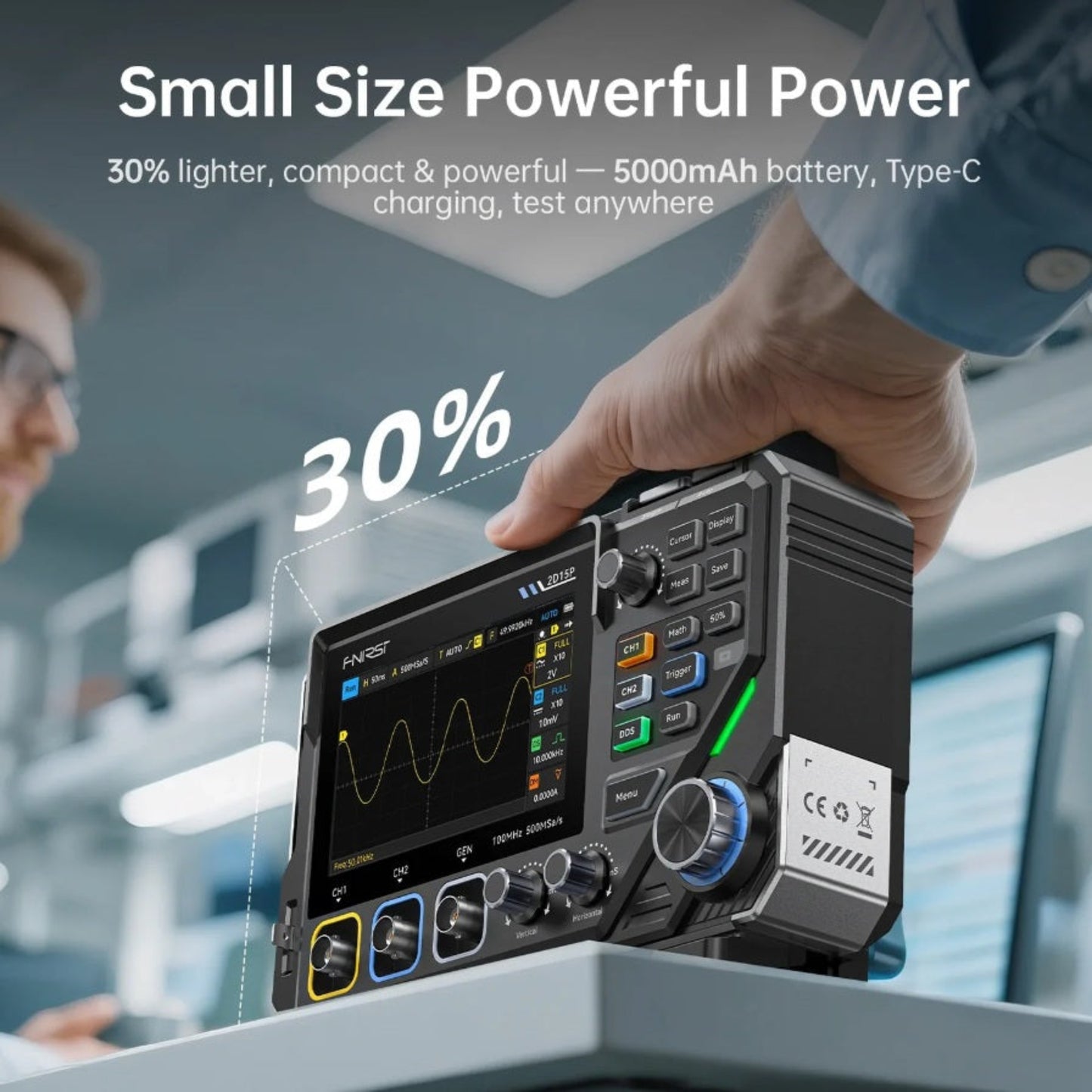 Technician holding the compact FNIRSI 2D15P showing portable size