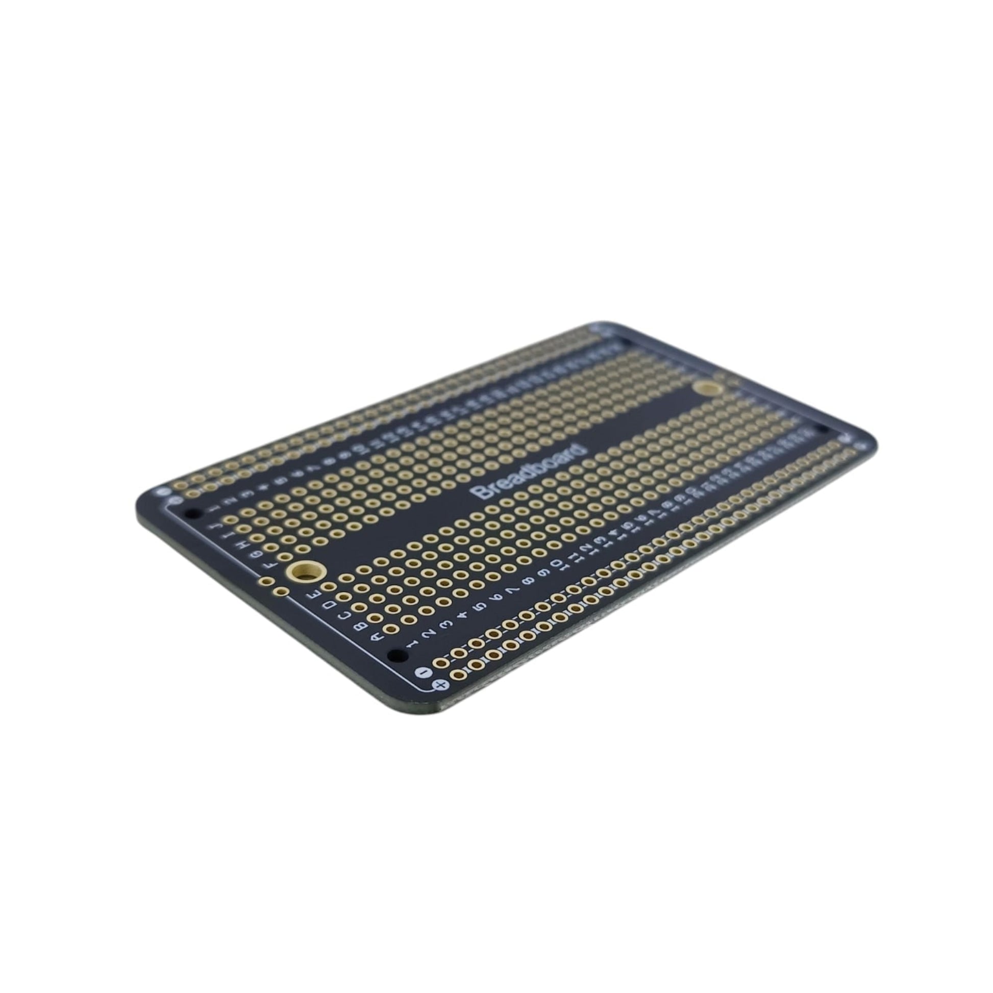 Angled close-up of breadboard-layout PCB showing 2.54mm pitch holes and high-quality FR-4 material.