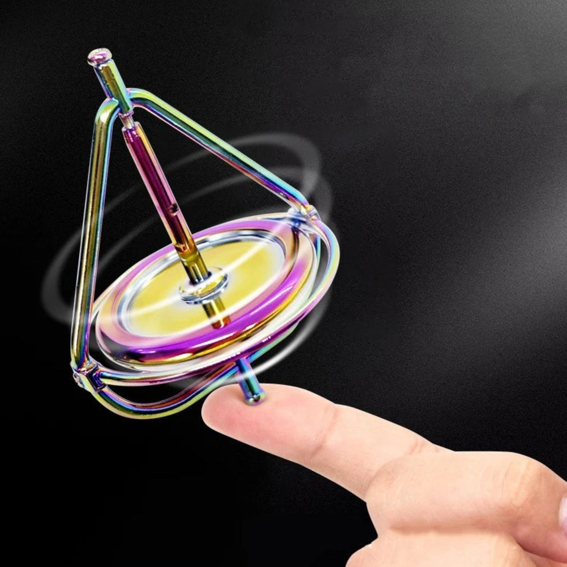 Spinning rainbow gyroscope balancing on fingertip to demonstrate anti-gravity effect and stability