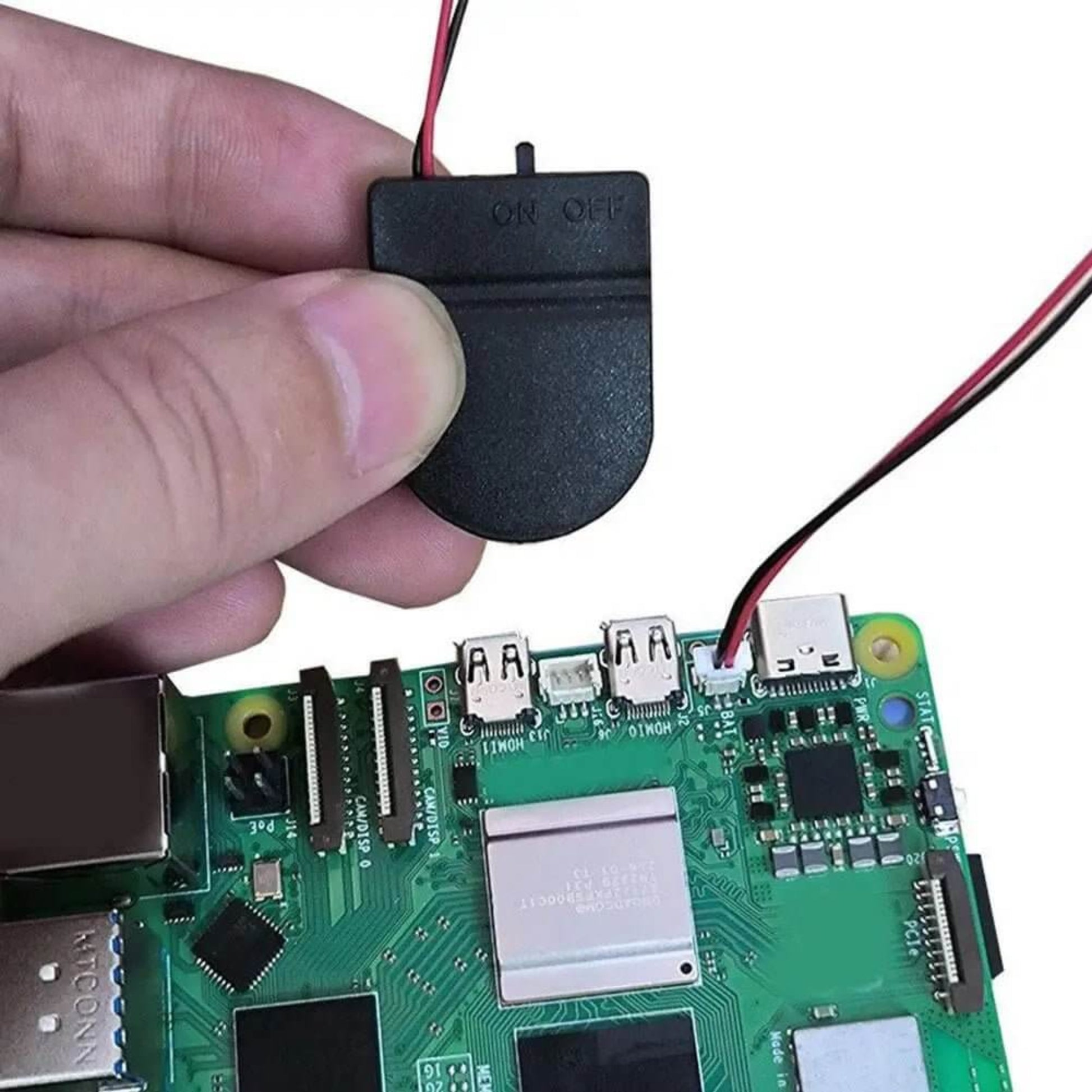 Describes the image content, showing the product being connected to the Raspberry Pi 5 board.