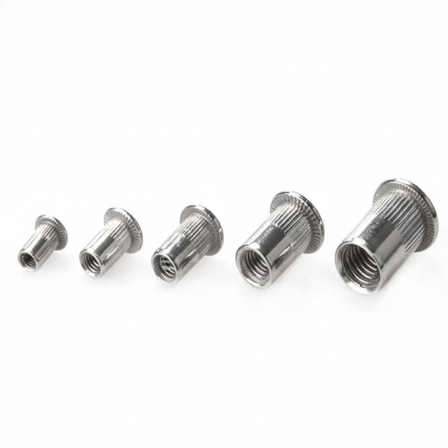Stainless steel ribbed rivet nuts M3 to M8 side view showing vertical knurling
