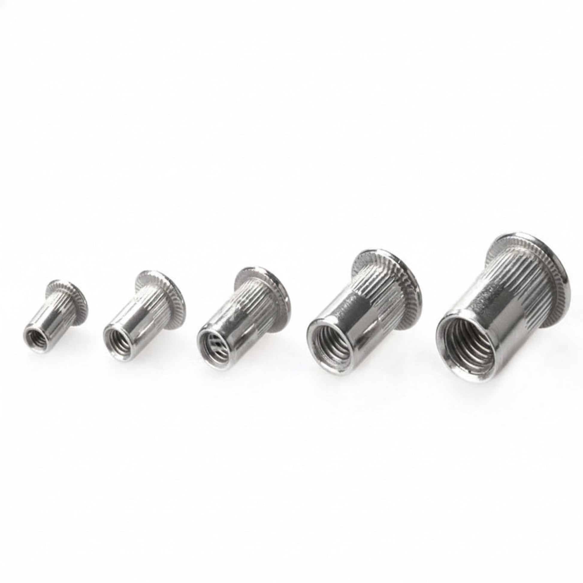 Stainless steel ribbed rivet nuts M3 to M8 side view showing vertical knurling