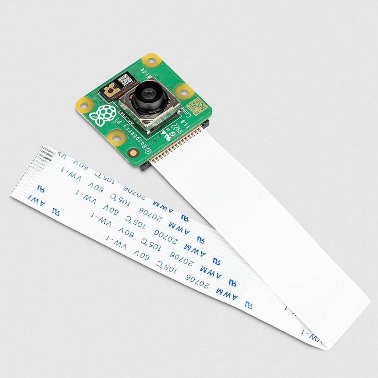 Close-up of the Raspberry Pi Camera Module 3 Wide showing the lens and flexible FPC ribbon cable