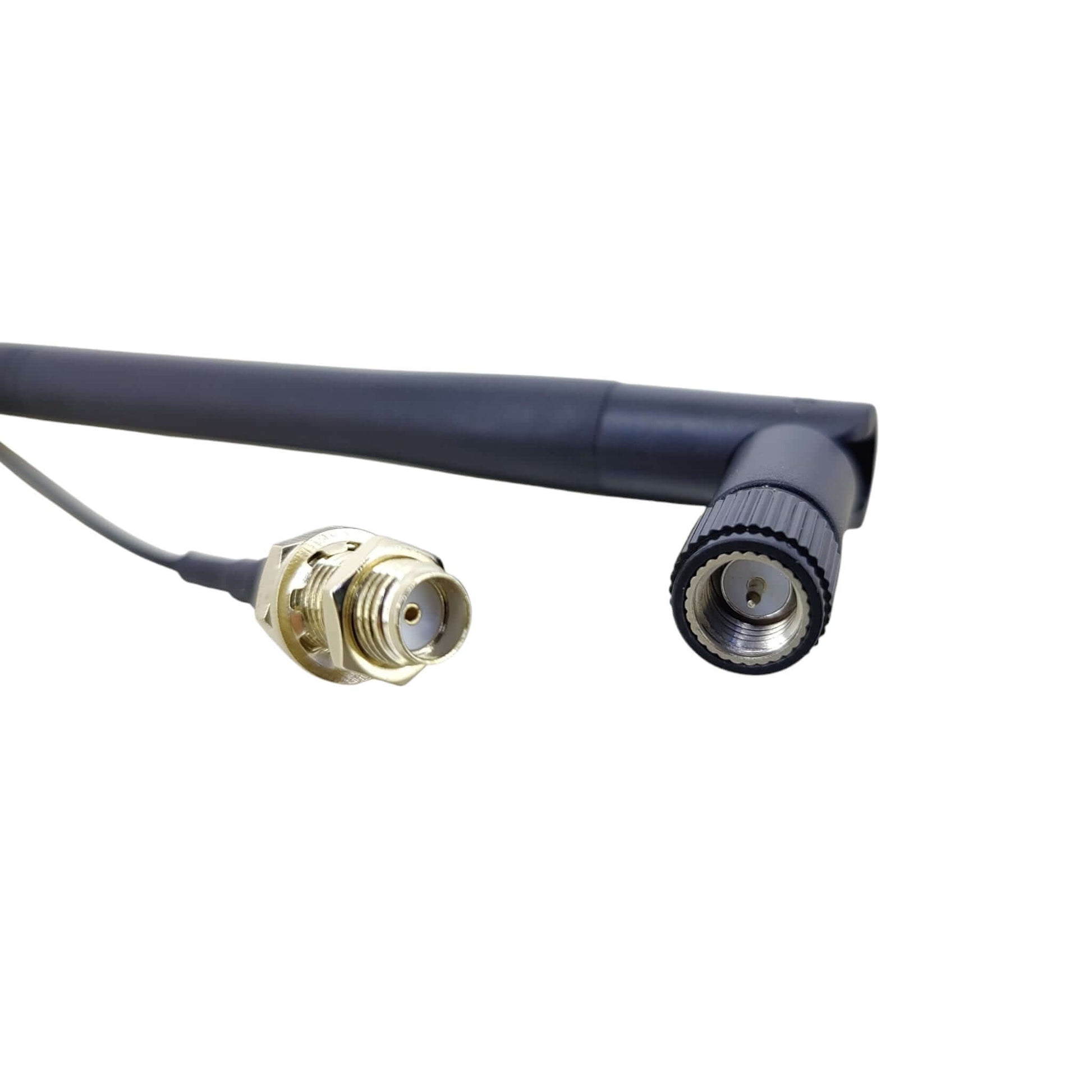 Close-up of SMA female bulkhead and IPEX U.FL connectors for wireless module signal boosting.