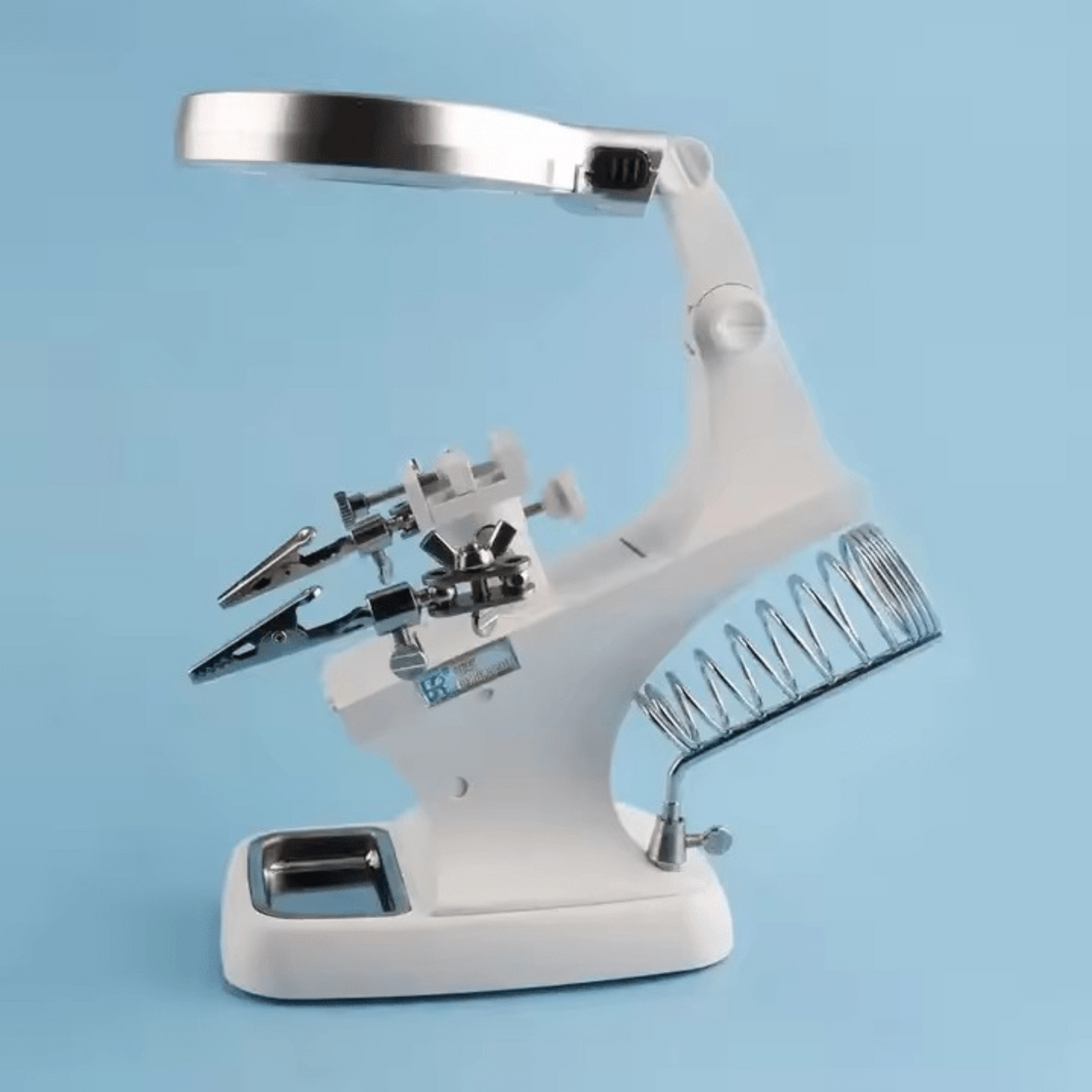Multifunctional welding magnifier with LED lighting and adjustable clamps for soldering and model making.