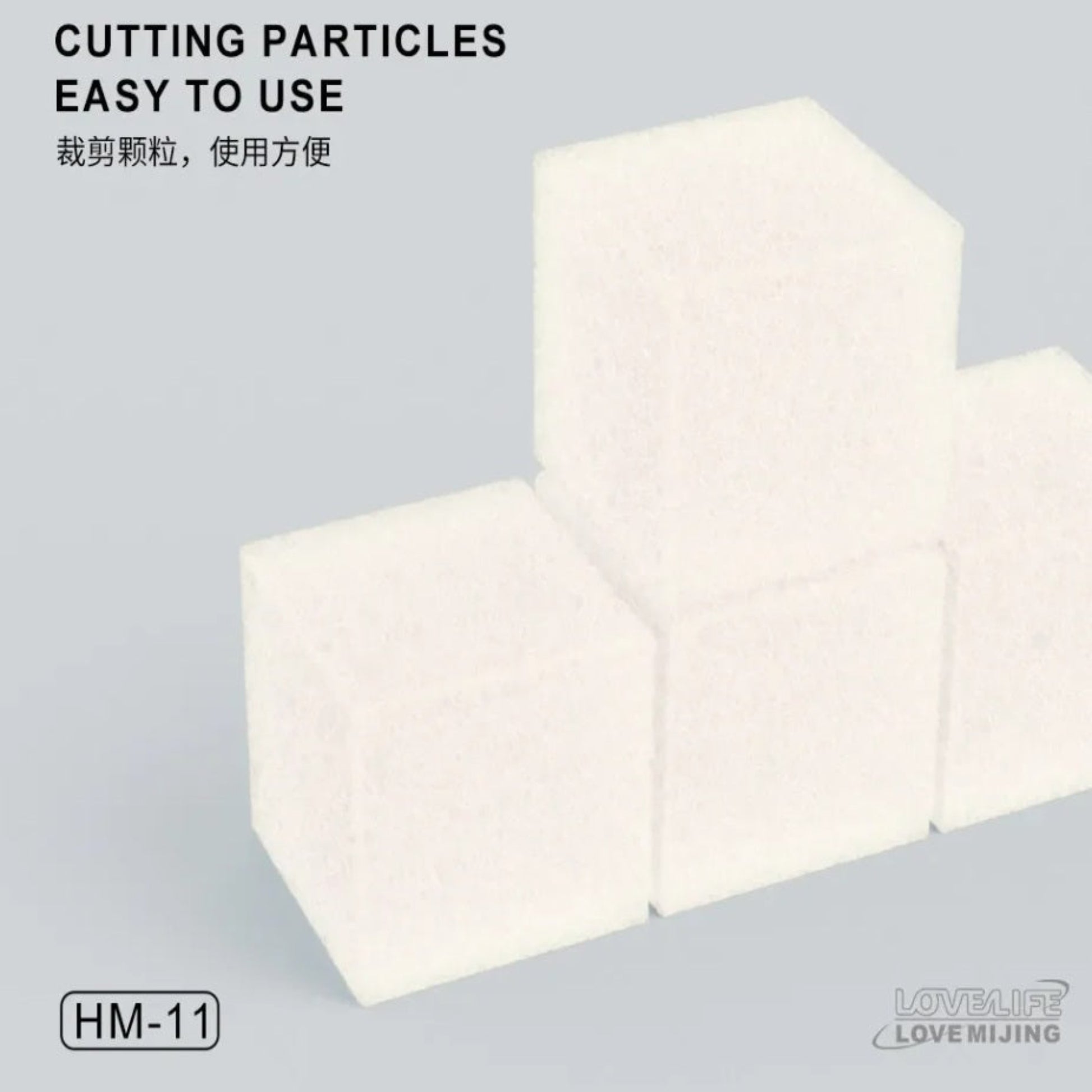 Detail view of individual white sponge cubes stacked, showing soft texture.