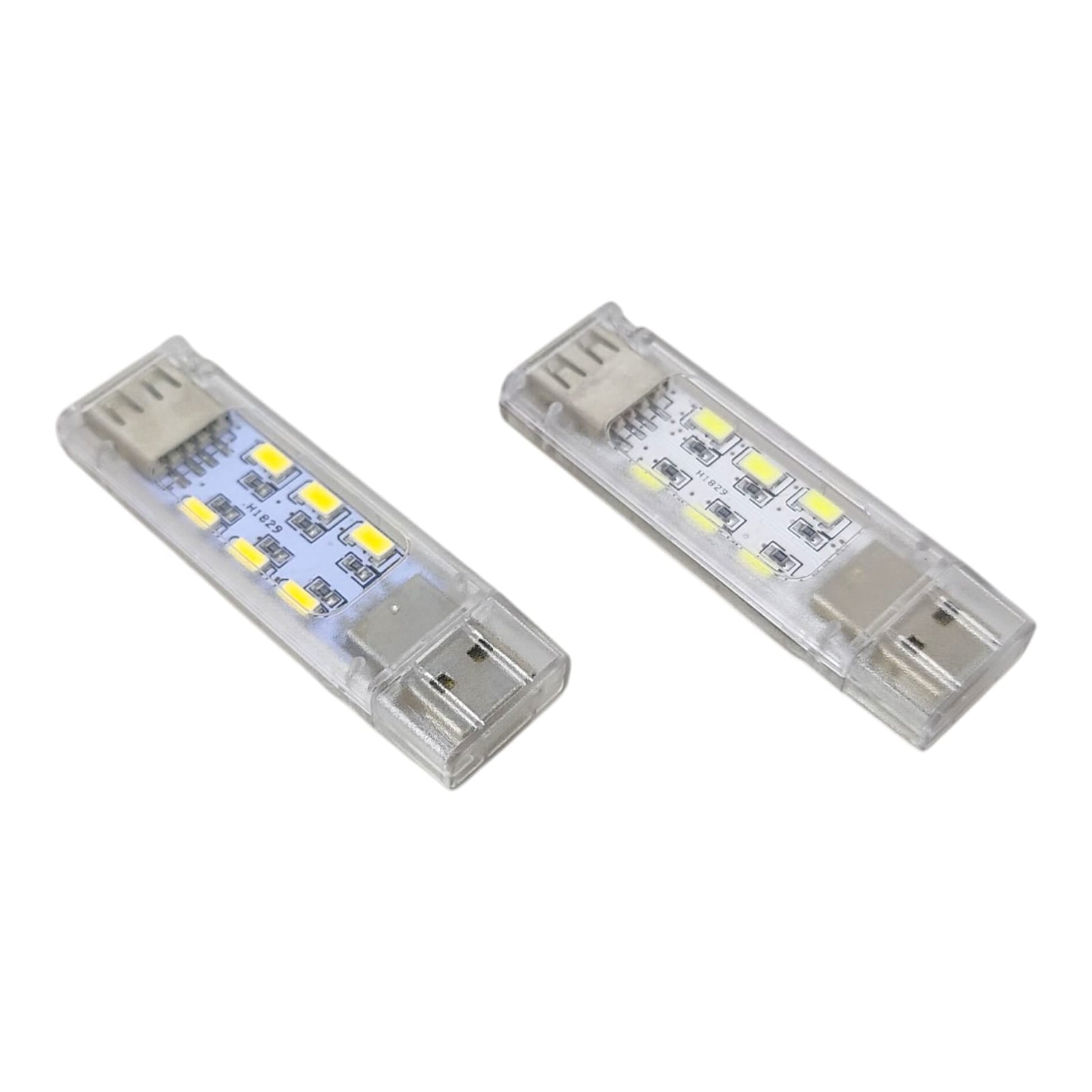 A pair of stackable 12-LED USB night lights, showing the male USB-A connector and female passthrough port.