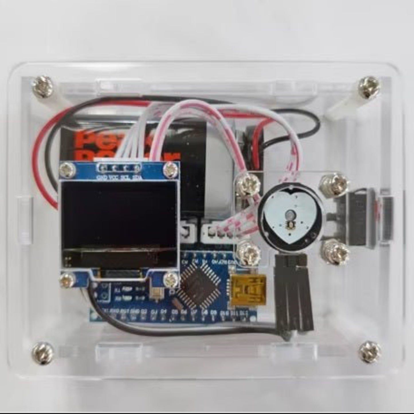 Heart Rate Monitoring Module for Arduino, illustrating components of a DIY kit designed for pulse detection and educational projects.