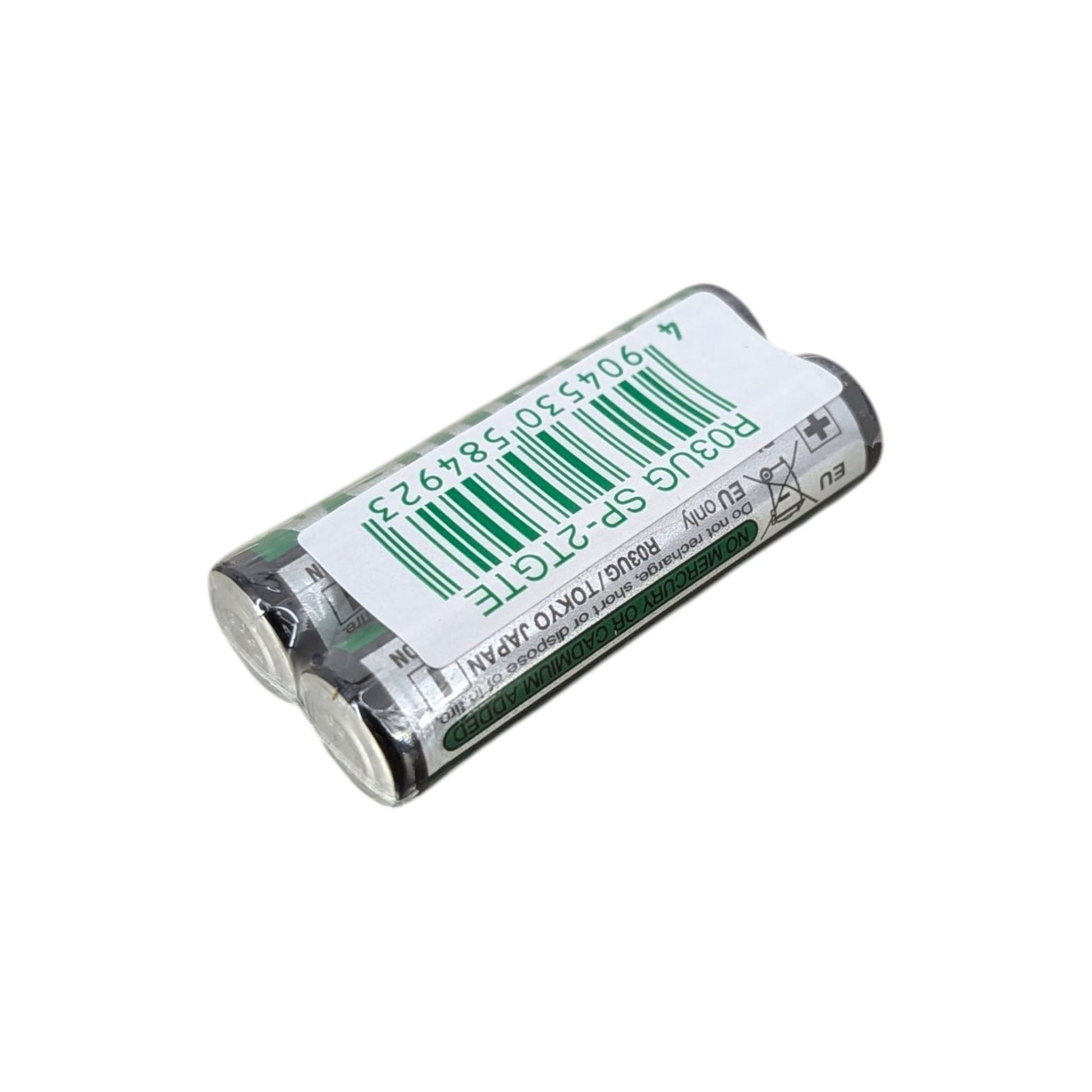 Toshiba 東芝 AAA 7號碳性電池底部特寫，清晰顯示 R03UG 型號及無添加水銀鎘的環保安全標籤。