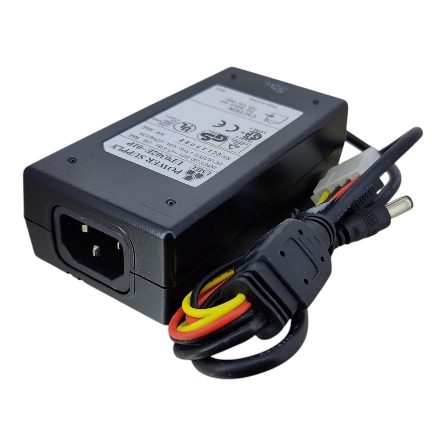 Angled view of the external power supply, showing the C14 AC power input socket and the output cable harness.