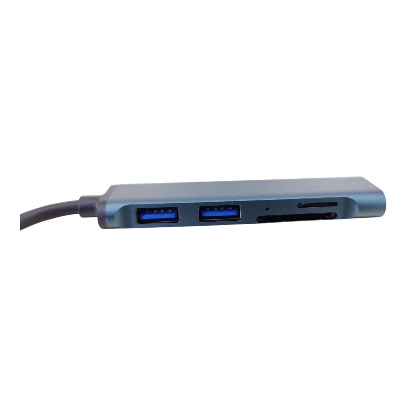 Close-up of USB 3.0 5-in-1 aluminum hub with two USB ports and card reader for laptops and MacBook.