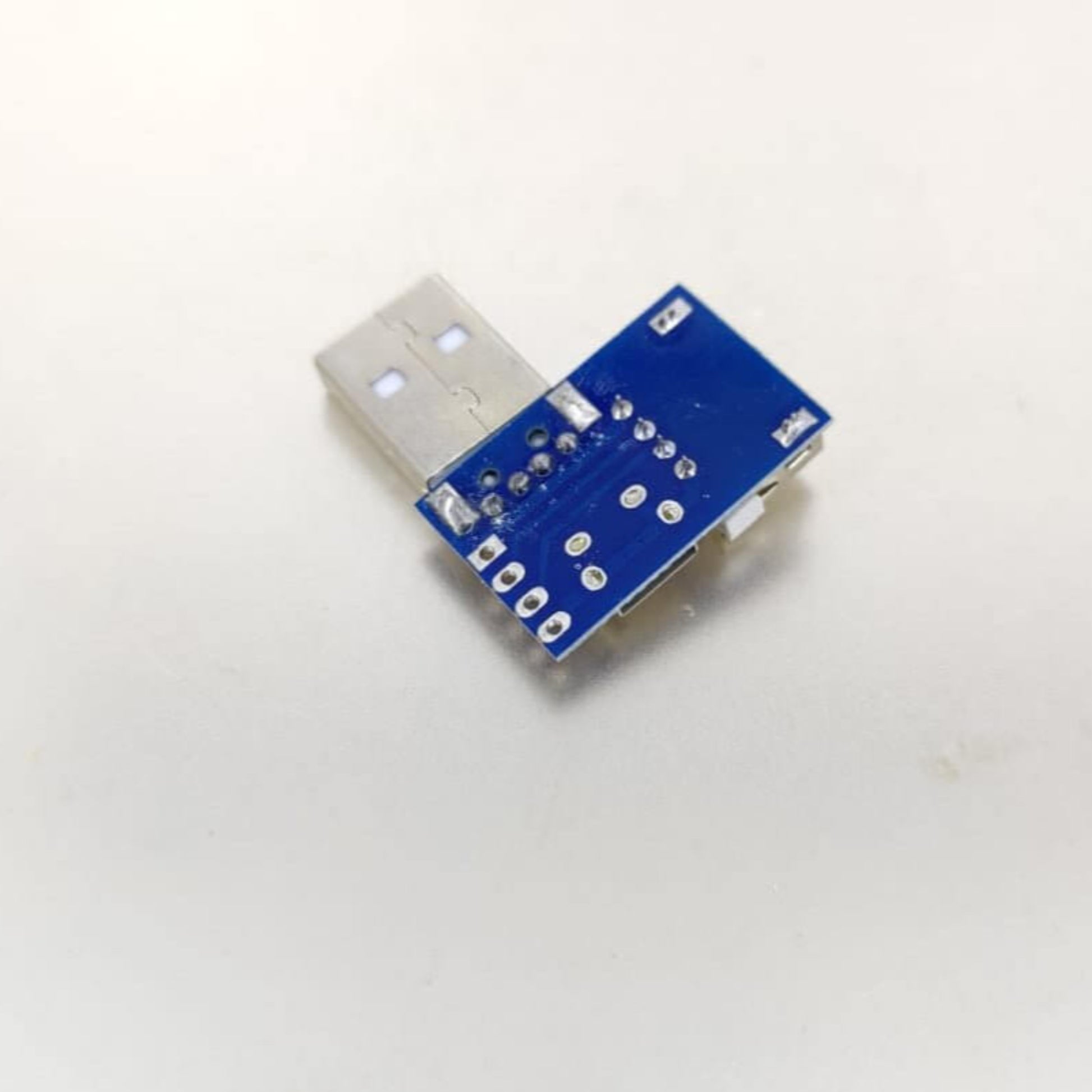 USB adapter board featuring USB-A male to female and Micro USB connectors for versatile connections.