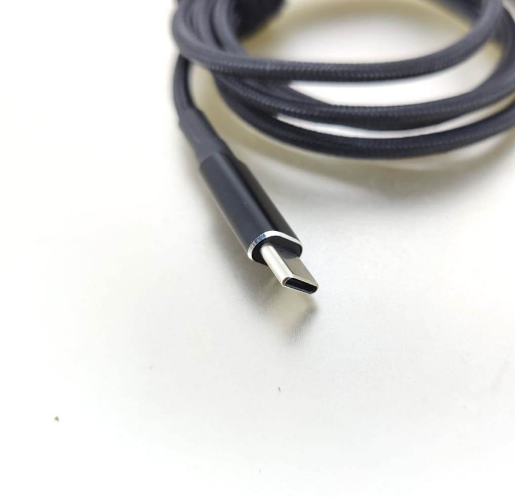 Close-up of USB-C connector on a braided charging cable designed for powering XT60 devices.