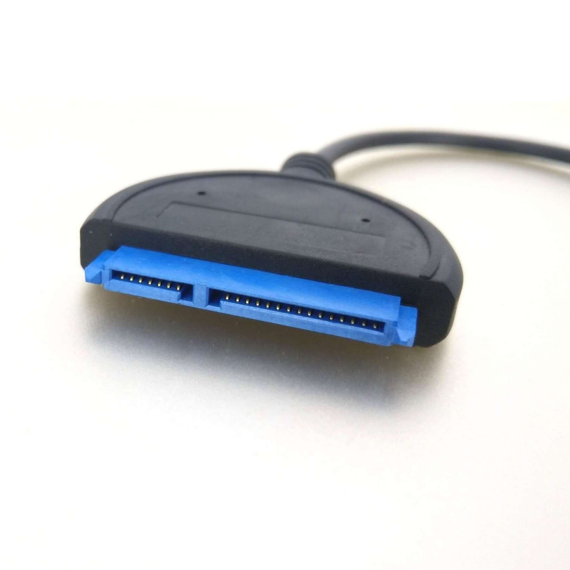 Close-up of a USB-C to SATA adapter cable connector for 2.5" SSD/HDD, designed for fast data access.