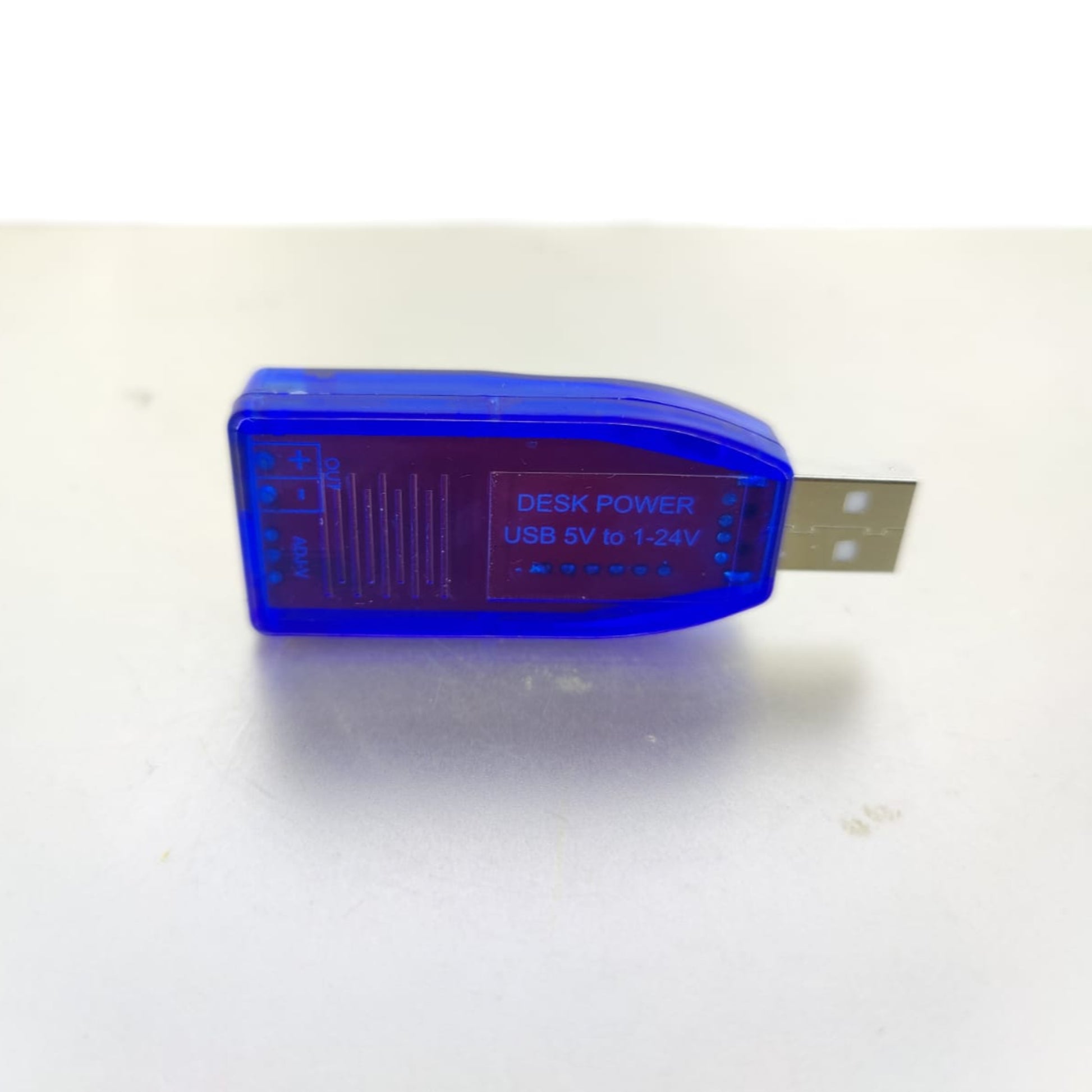 USB 5V to 1-24V adjustable step up module with LED display for voltage regulation.