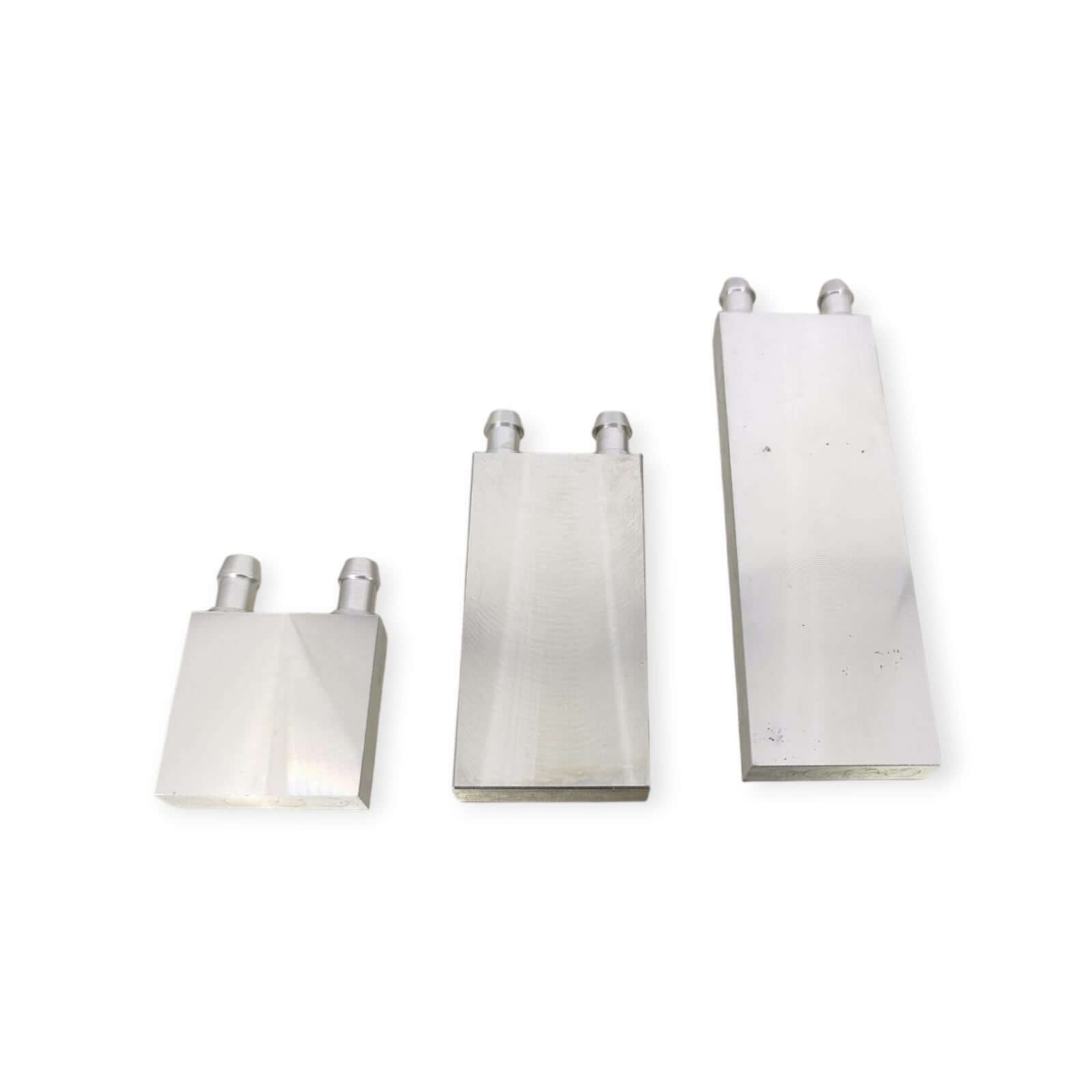 Three aluminum water cooling blocks in varying sizes for efficient thermal management of CPU, GPU, and industrial applications.
