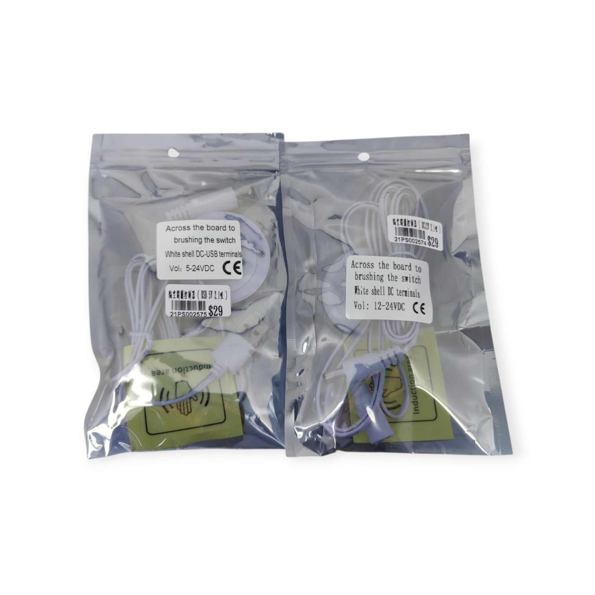 Two wave sensor switches in their retail packaging, showing product details for both the DC and USB versions.