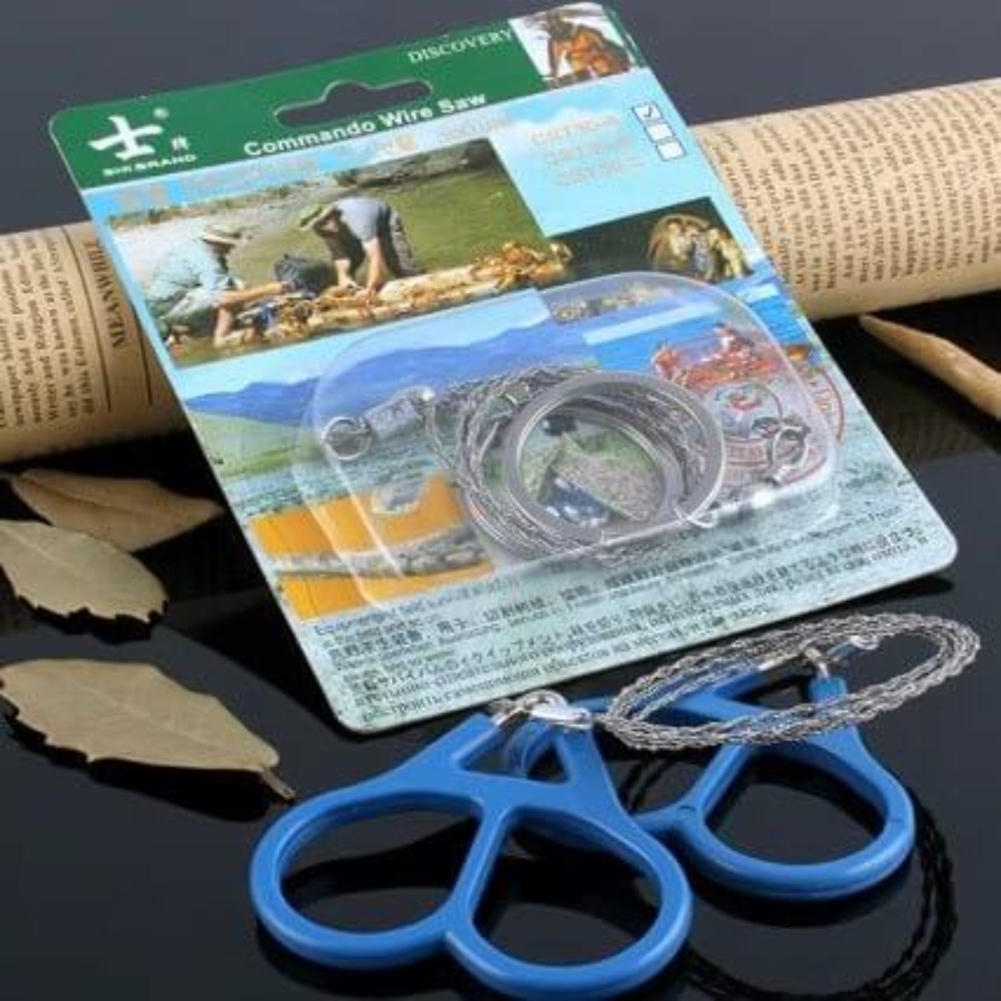 Wire Saw (Stainless Steel) – Pocket-Sized Cutter for Wood, PVC in blue packaging on black surface.