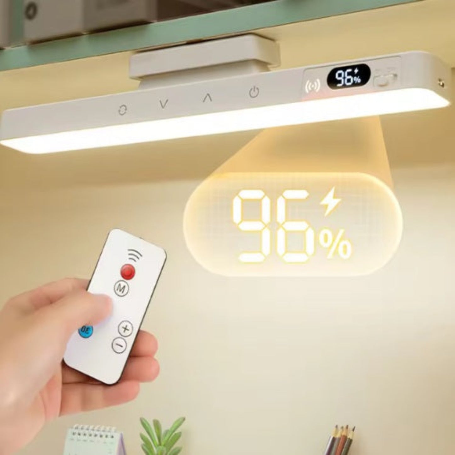 Using a wireless remote to adjust the 96 percent brightness level on the magnetic LED light bar.