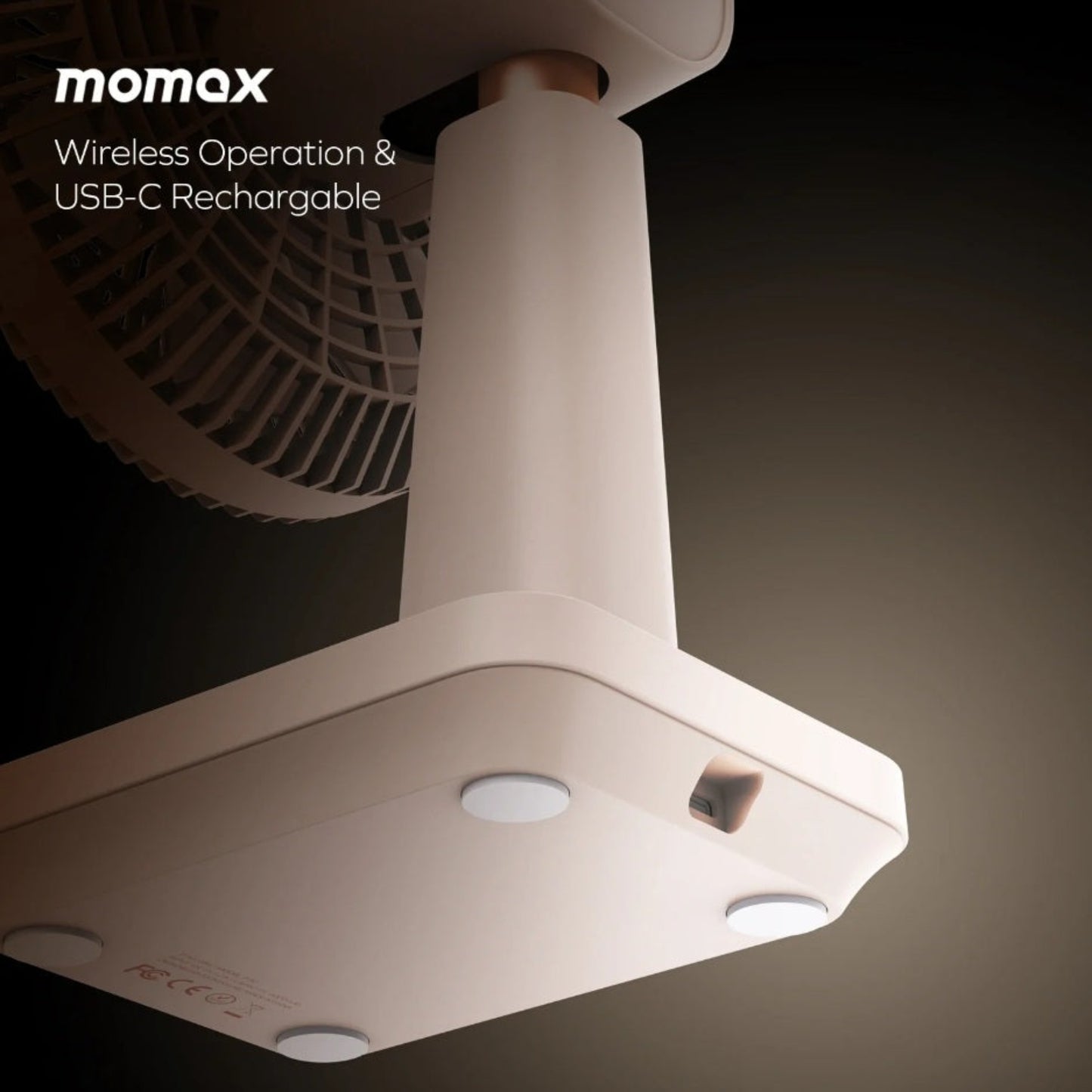 Underside of the Momax desk fan highlighting the USB-C charging port and anti-slip silicone pads.