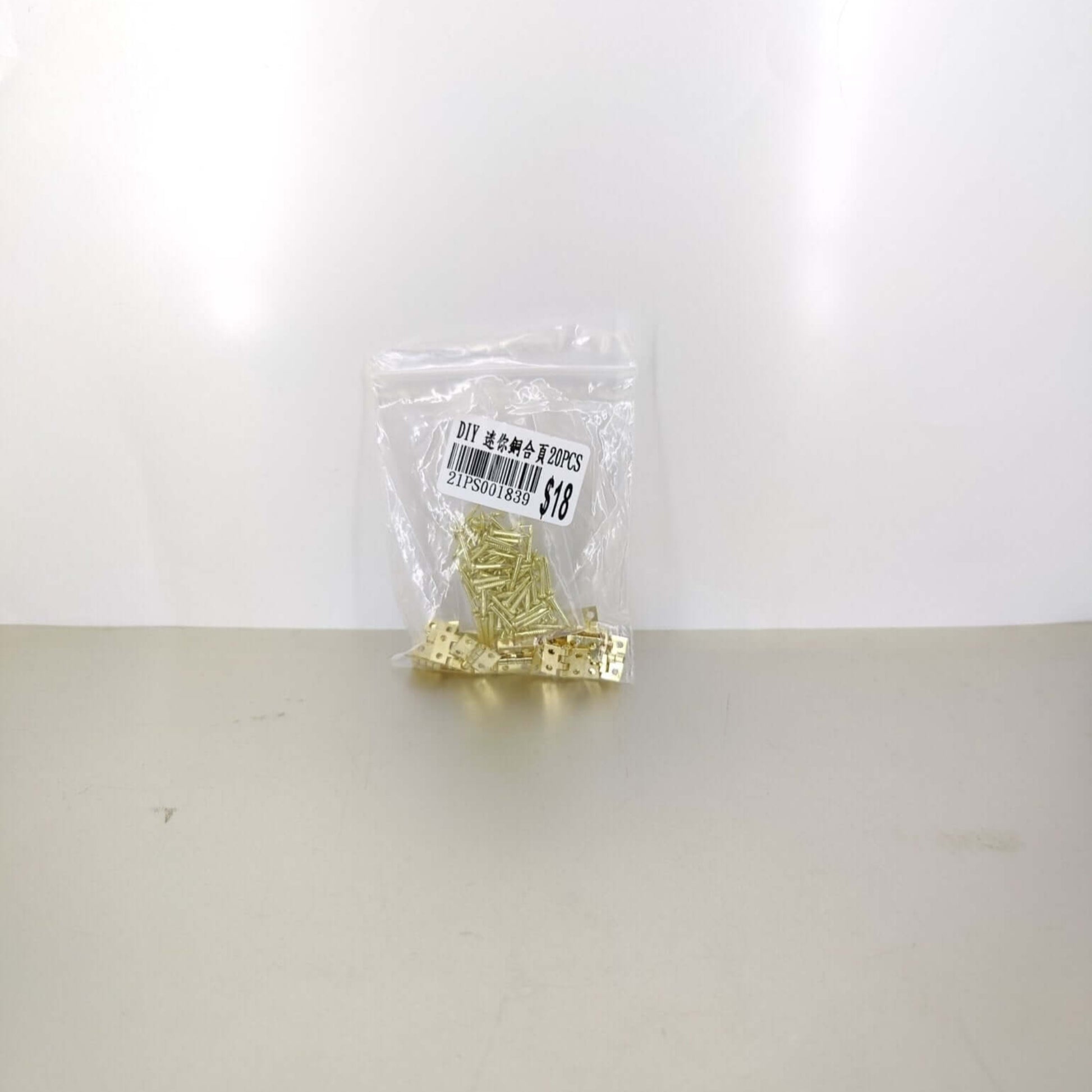 A pack of 20 mini hinges, sealed in a clear bag, labeled for DIY use and quantity, convenient for storage and shipping.