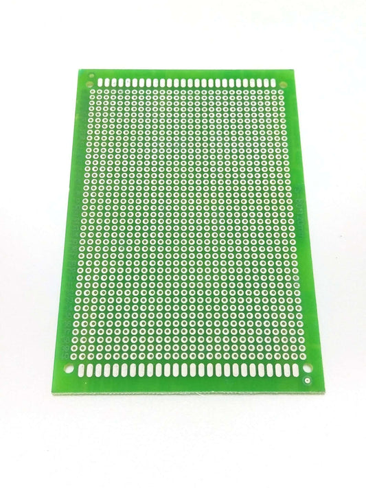 8x12cm single-sided copper prototype PCB for Arduino and soldering projects, featuring a green fiberglass surface.