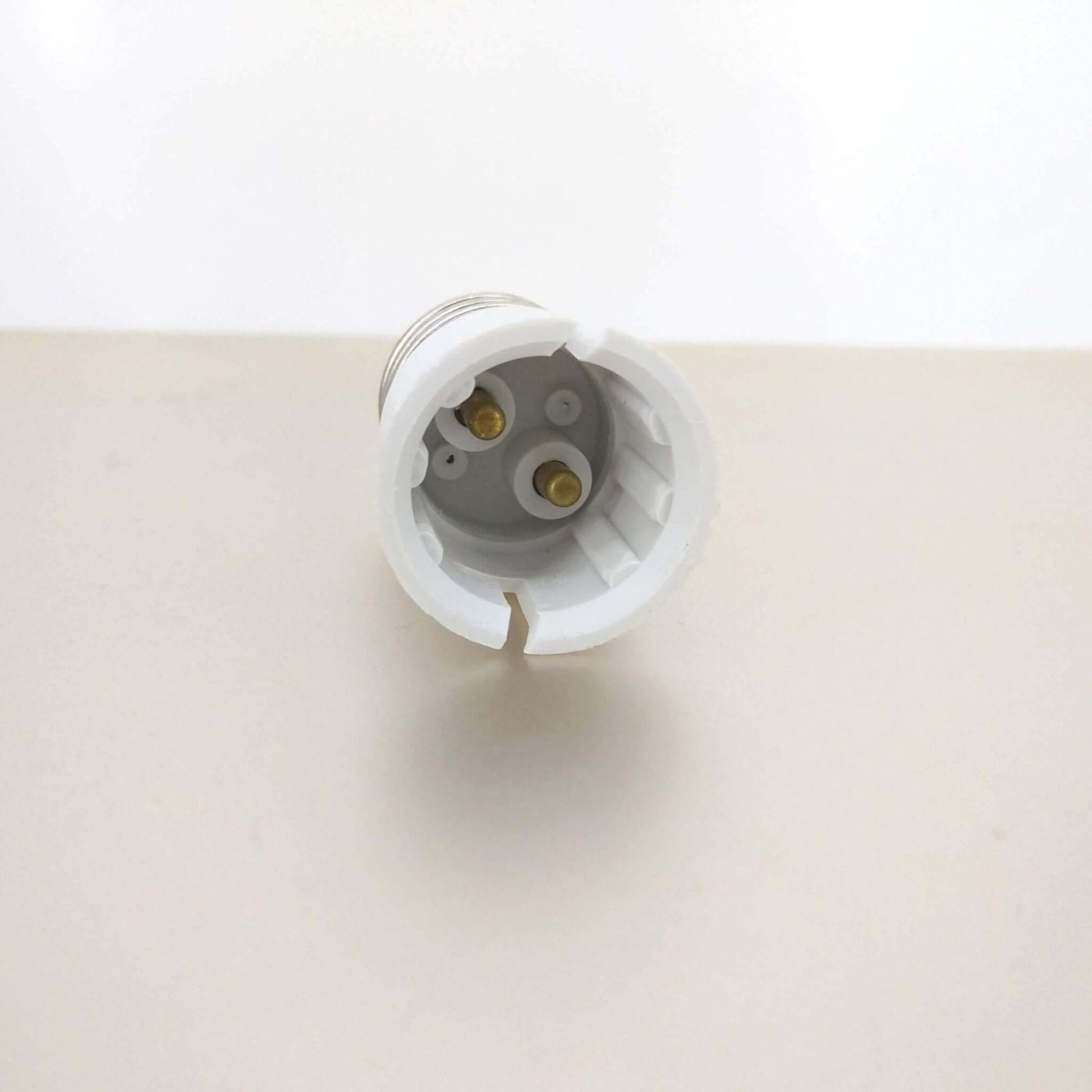 E27 Male to B22 Female Light Bulb Adapter showing connection points for easy light bulb compatibility.