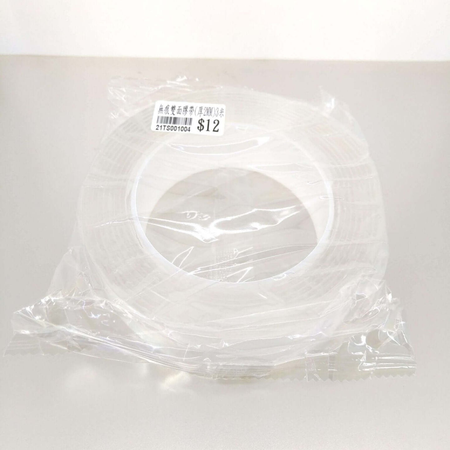 Multi-functional 3M nano adhesive tape packaged for easy storage and organization, showcasing its reusable and washable features.