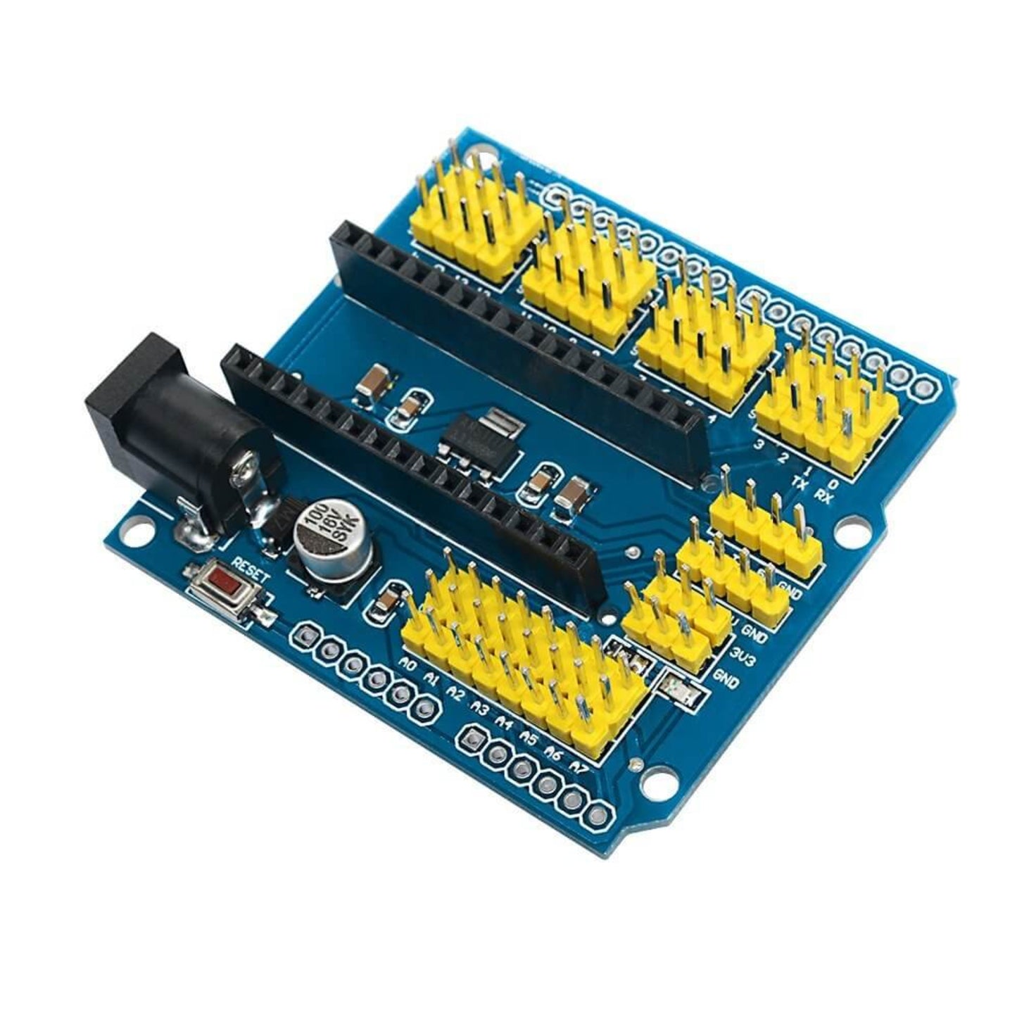 Angled view of Arduino Nano I/O expansion shield showing yellow headers and DC power jack.