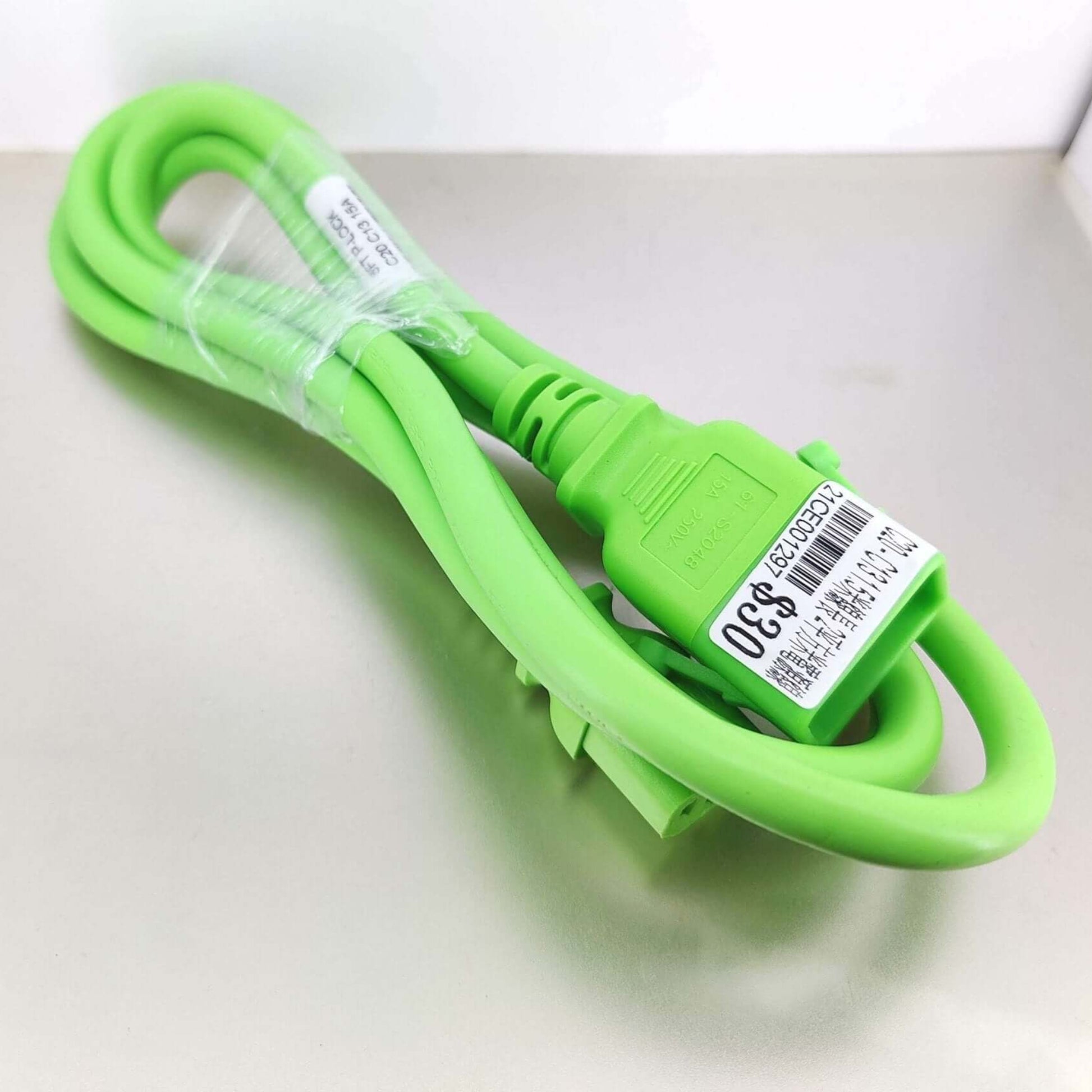 Green C13 to C20 power cord, 14 AWG, 1.5m heavy-duty cable for high-powered servers and power distribution units.