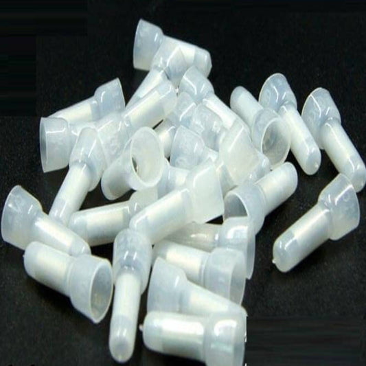 A close-up view of multiple CE-2X closed-end wire connectors, showing the white PP material and internal aluminum tube.
