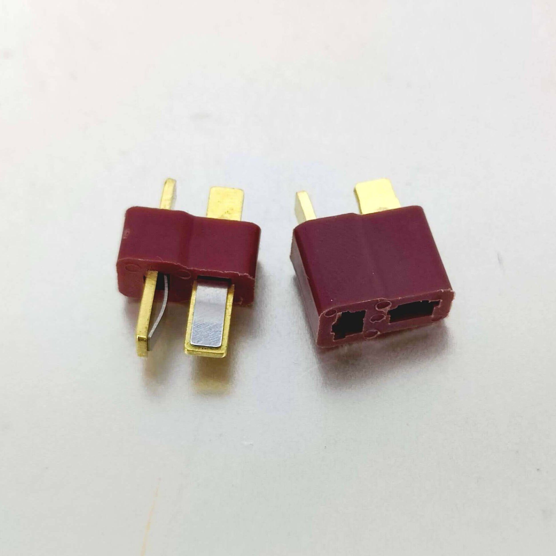 T-Plug male and female connectors in red for RC LiPo battery ESC, designed for secure connections and low resistance.