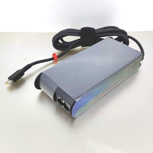 Lenovo 95W USB-C laptop charger with its USB-C connector, compatible with ThinkPad X1 Carbon.