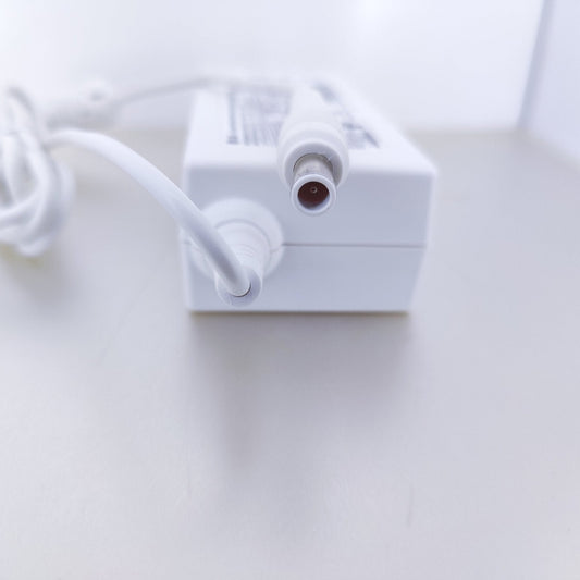 Close-up of the DC connector pin for LG 19V 2.53A monitor power supply.