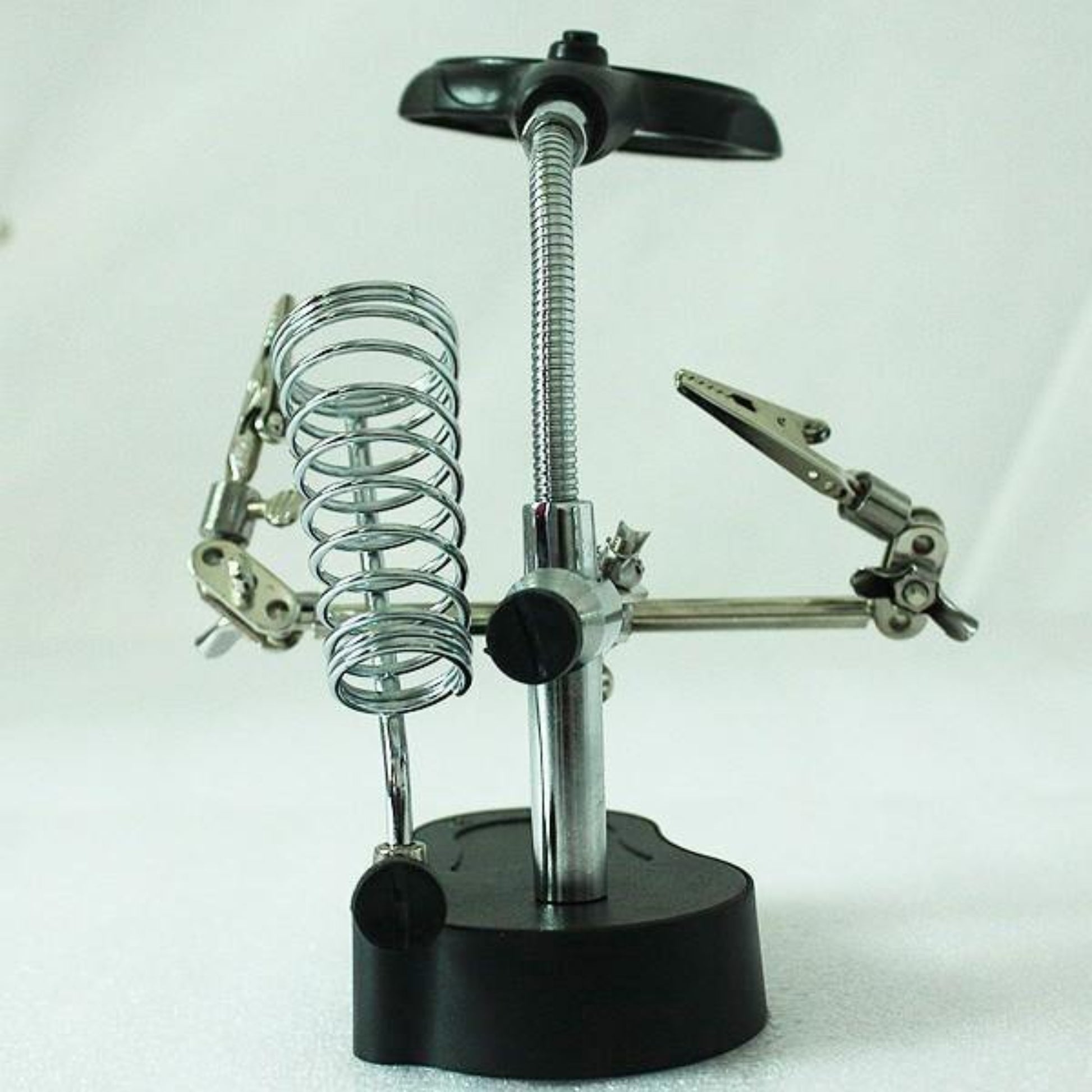 3.5X 12X magnifying glass tool with soldering iron stand and clips, ideal for jewelry and electronics work.