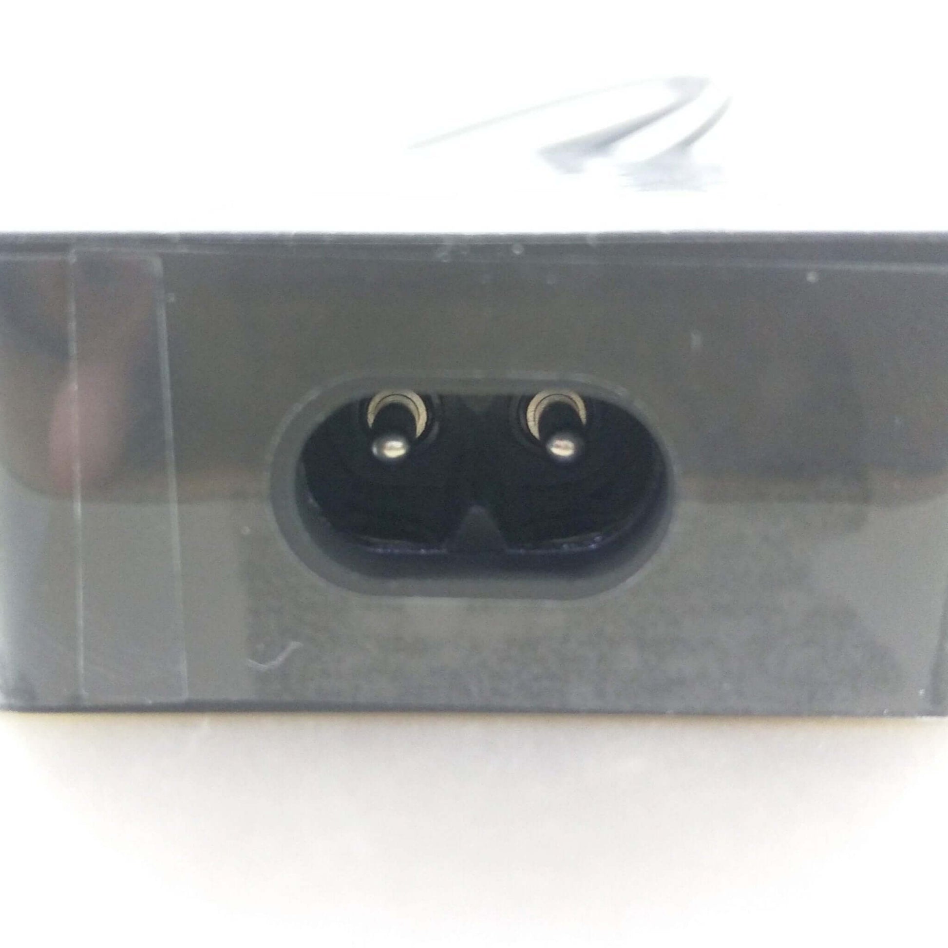 Close-up of the power connector port of a Microsoft Surface charger for reliable device charging.