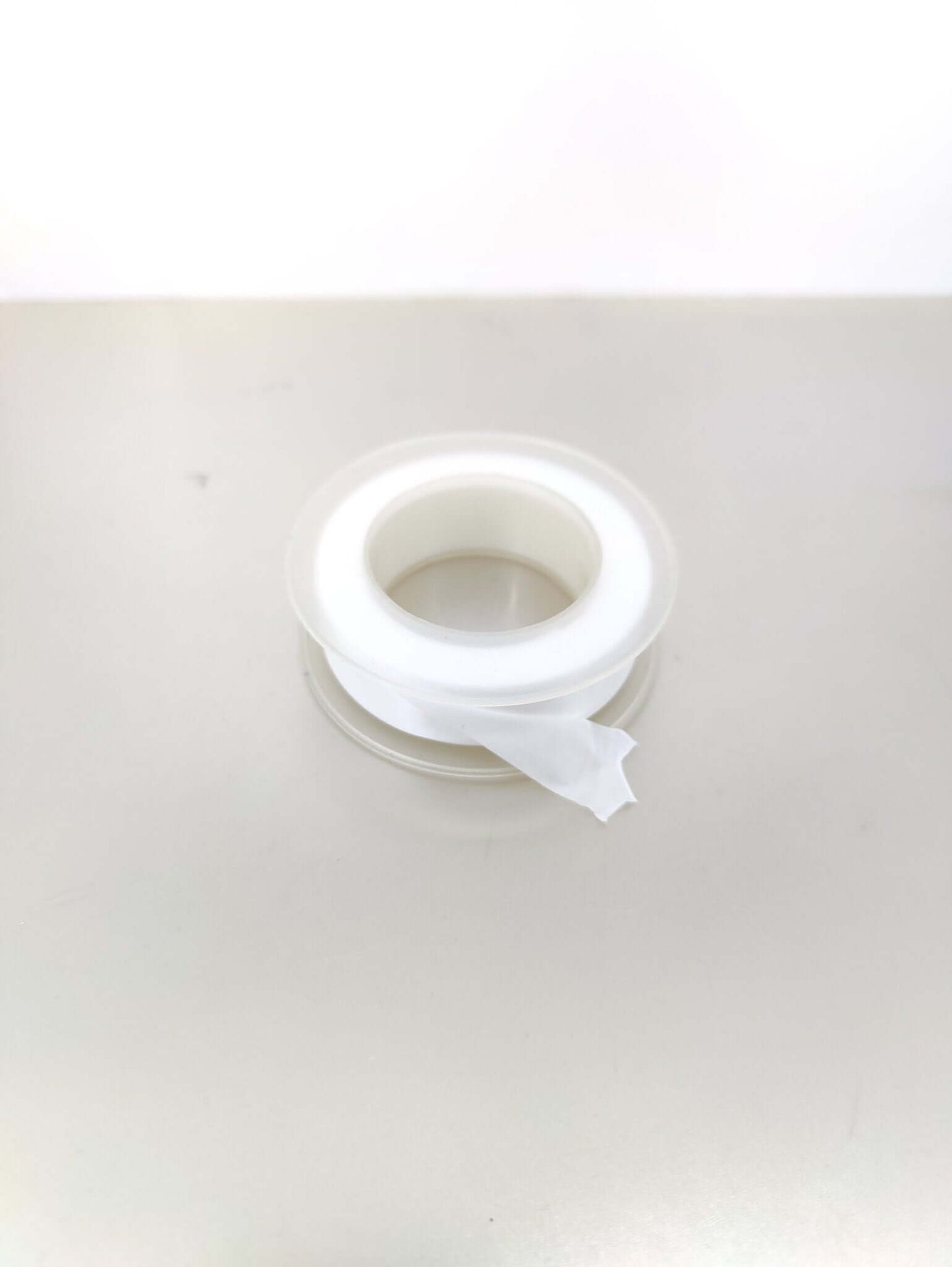 Premium PTFE thread seal tape roll for plumbing and gas applications, ensuring watertight and gas-tight seals.