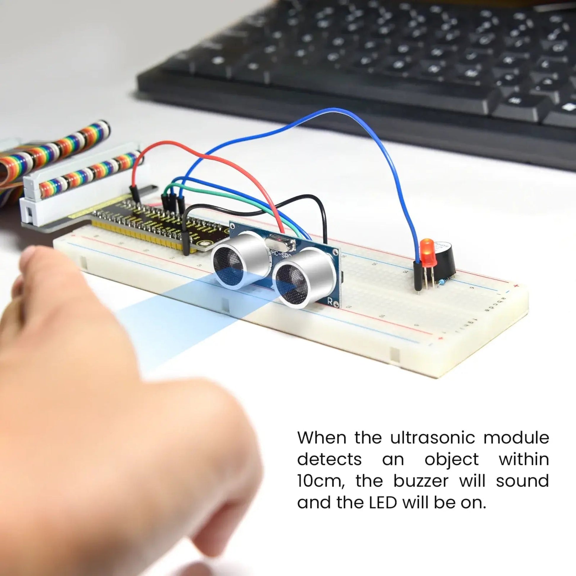 An ultrasonic distance sensor project with an LED and buzzer, built using the Keyestudio Raspberry Pi kit.